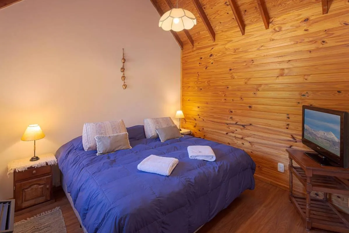 Bed in Cabañas Del Lacar