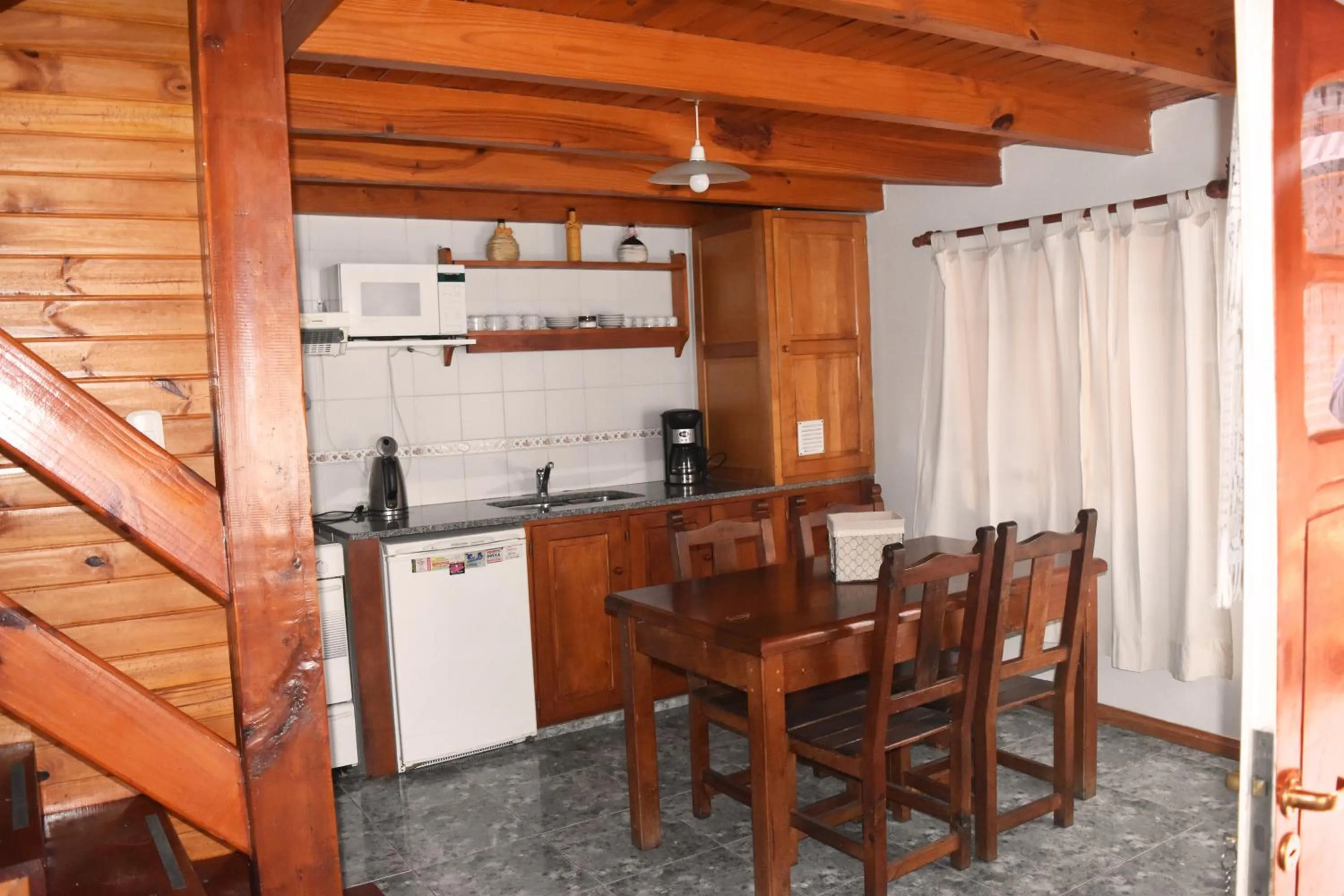 Kitchen or kitchenette in Cabañas Del Lacar
