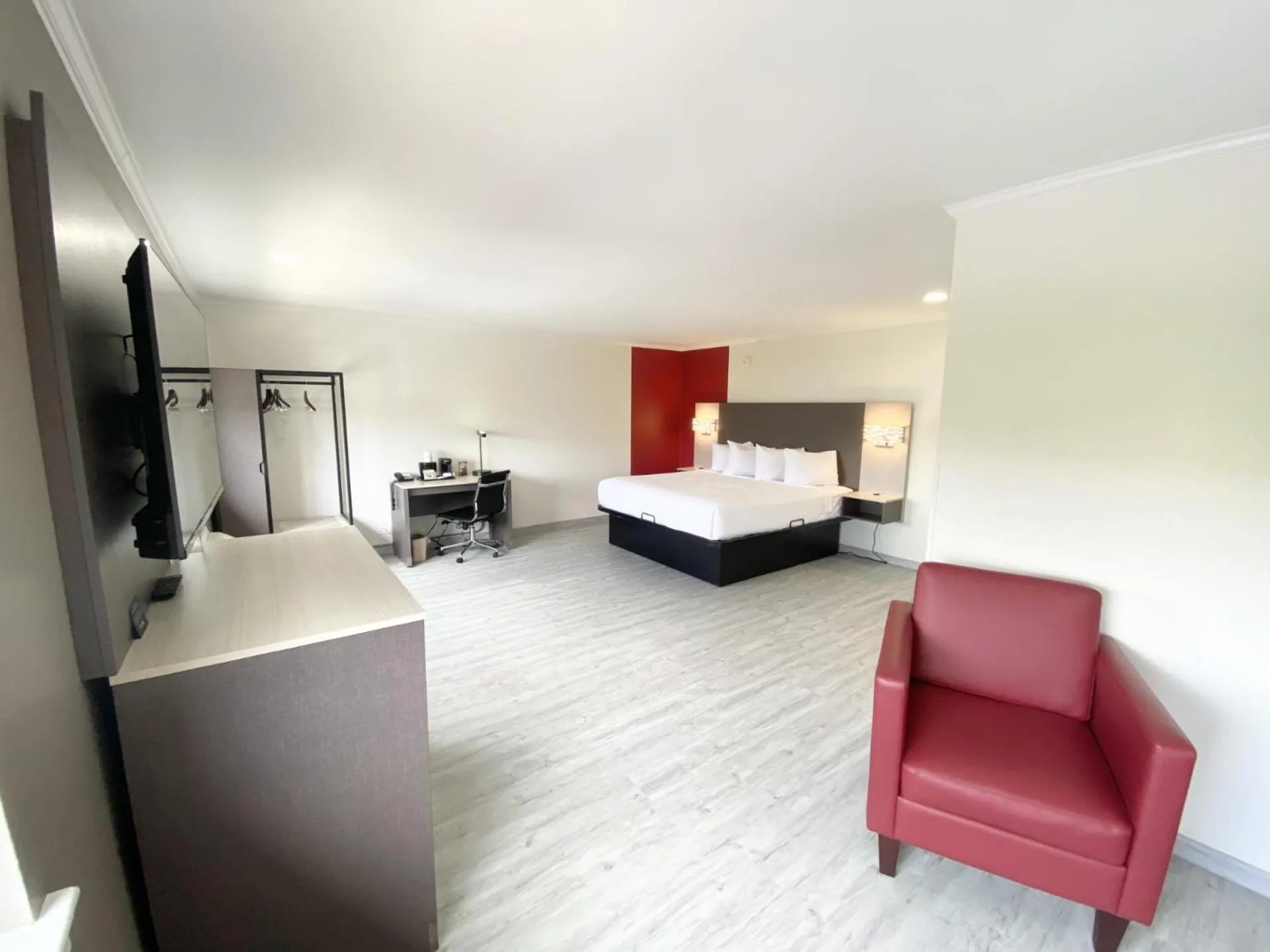 Bed in Ramada by Wyndham Tuscaloosa