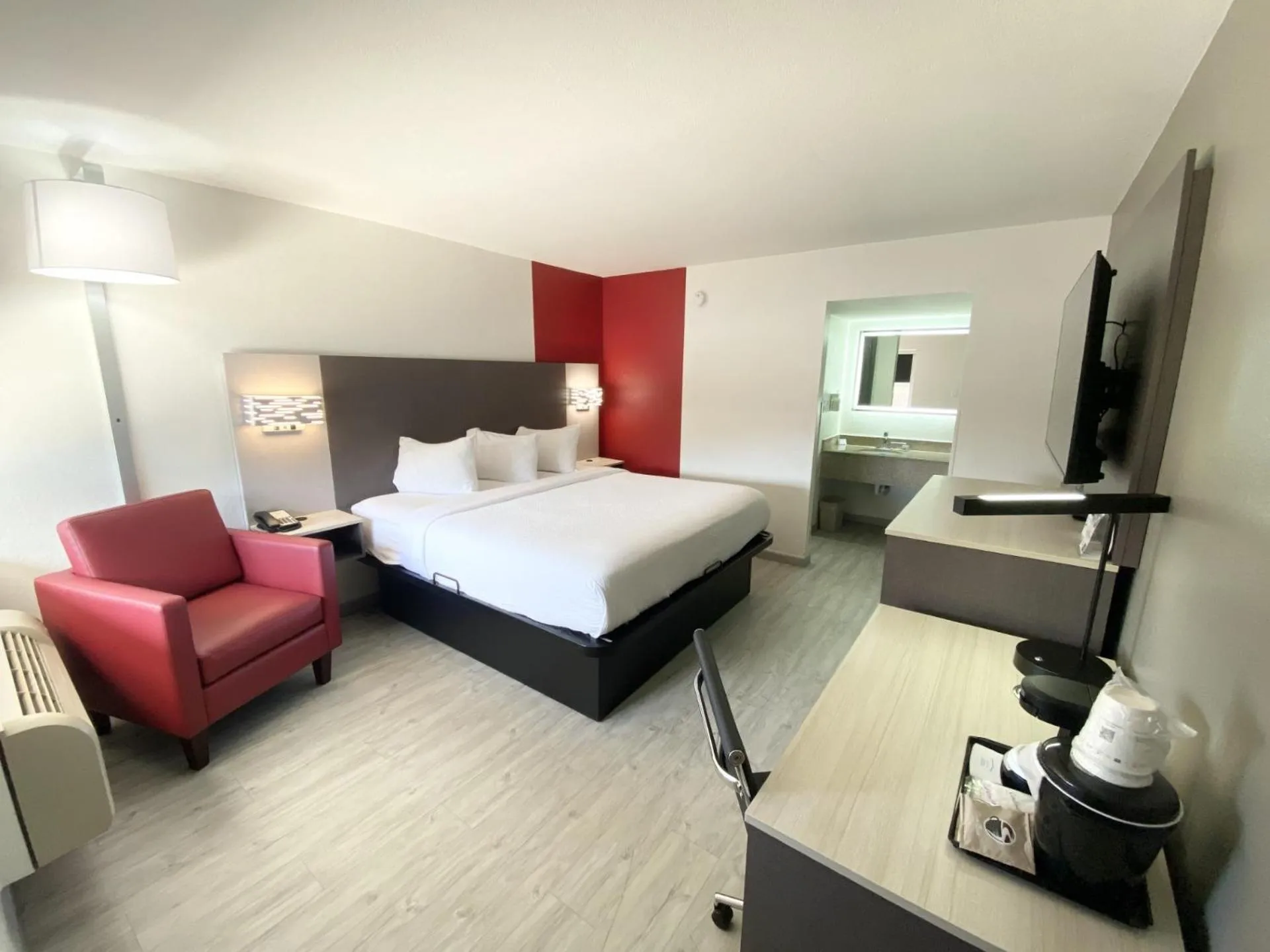 Bed in Ramada by Wyndham Tuscaloosa