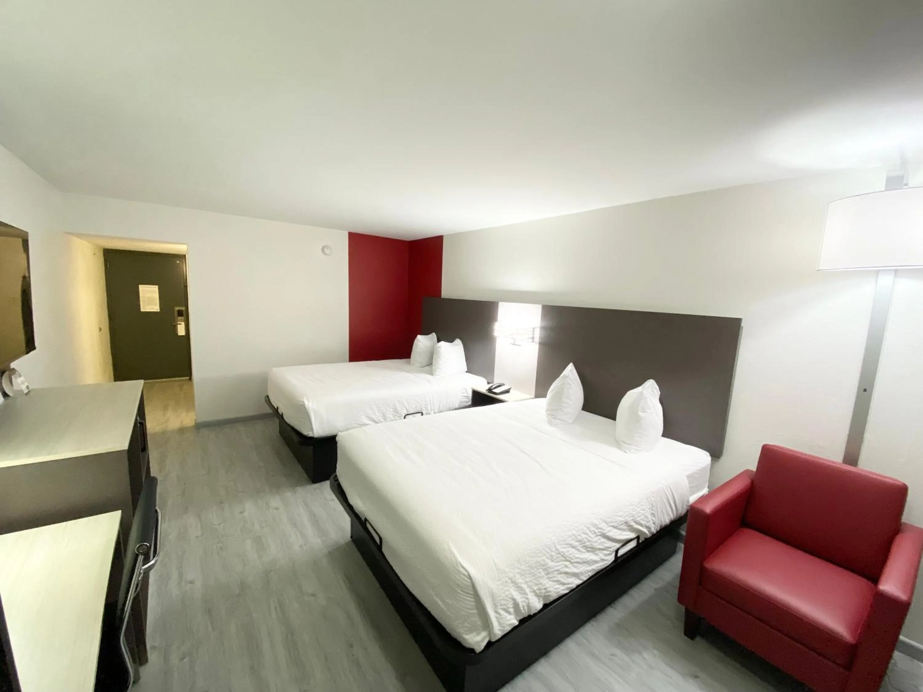 Bed in Ramada by Wyndham Tuscaloosa