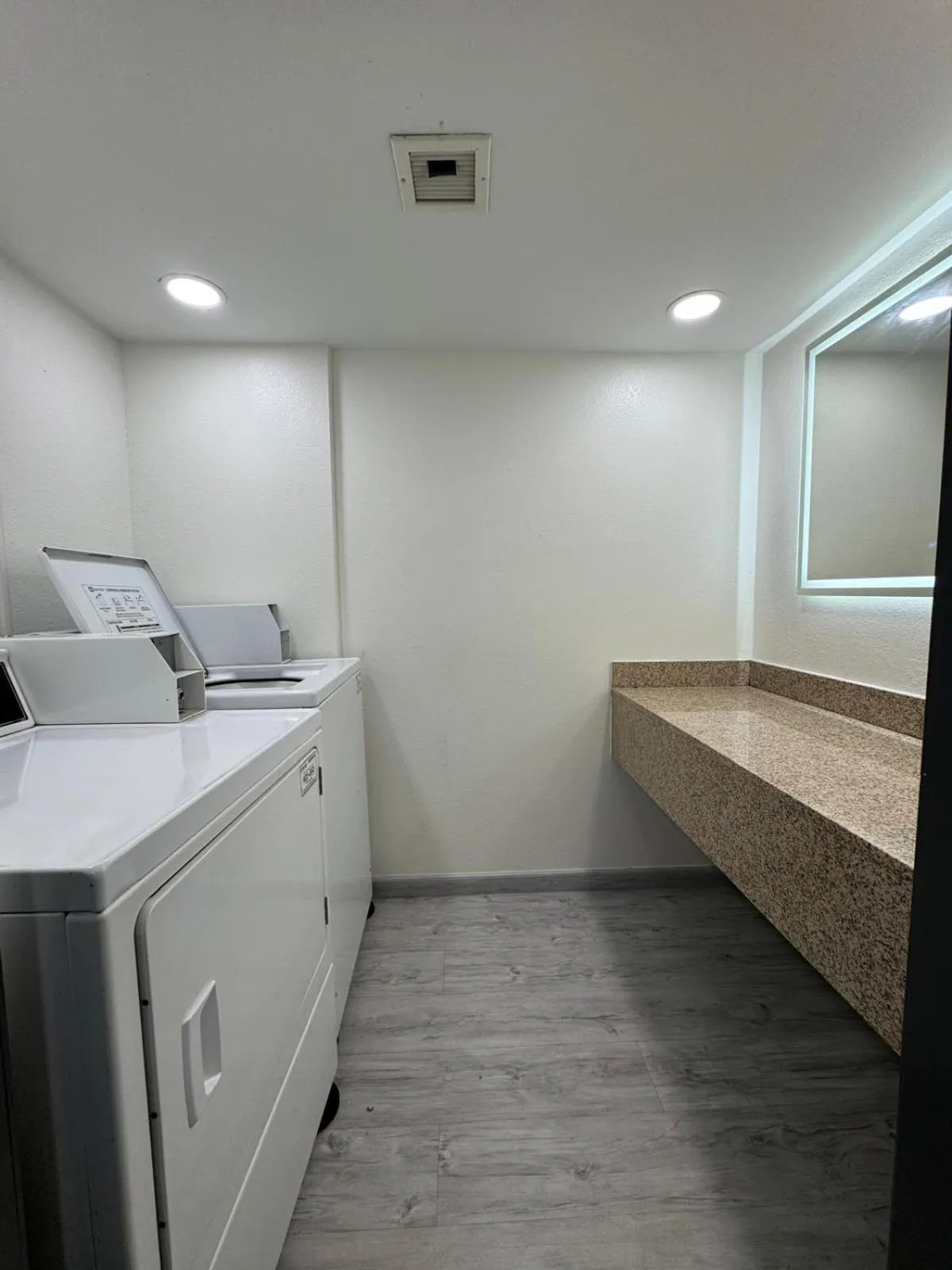 laundry in Ramada by Wyndham Tuscaloosa