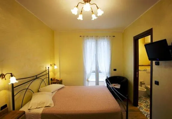 Photo of the whole room, Bed in Albergo Cecchin