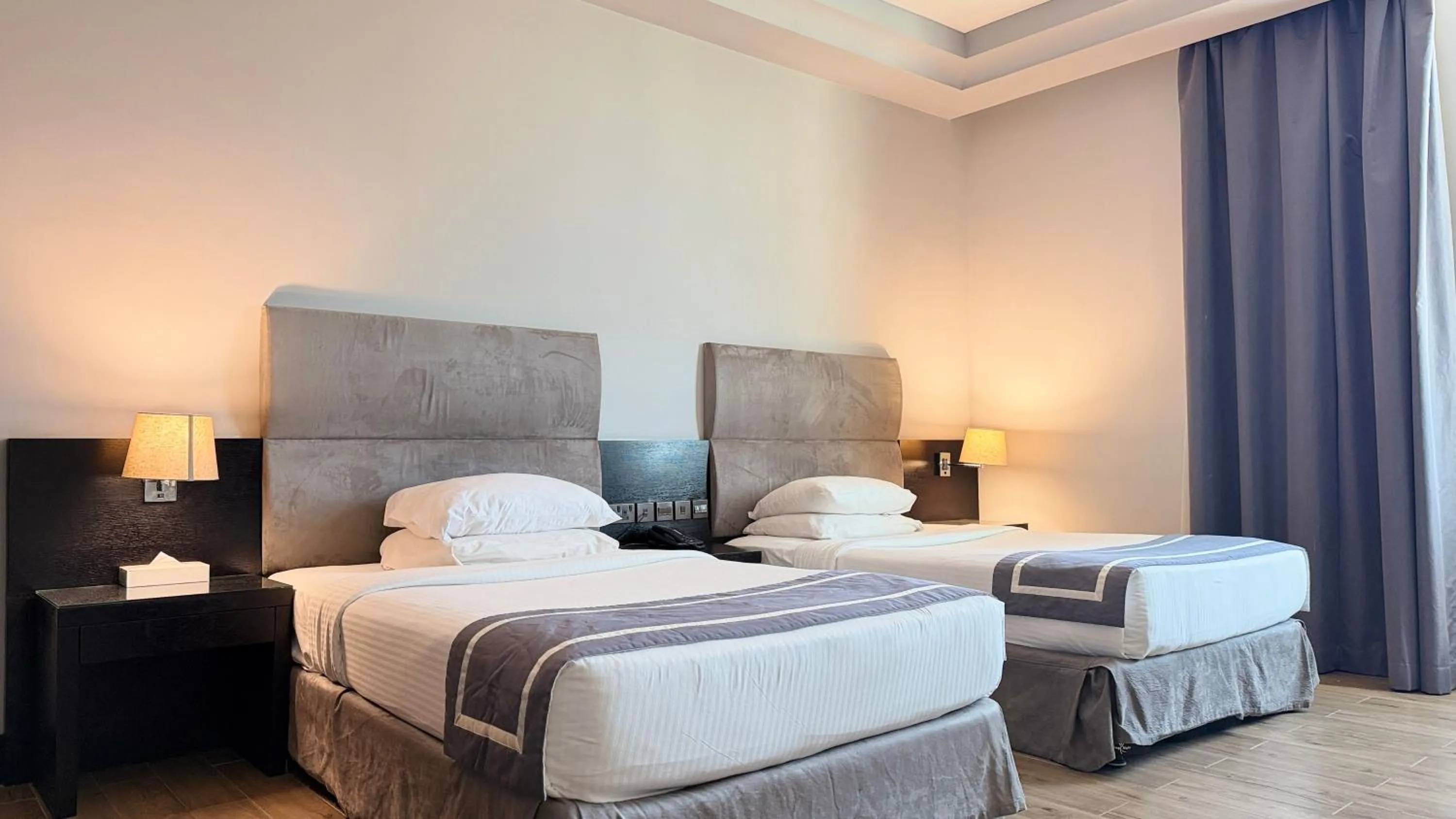 Bed in Sunday Mangrove Corniche Hotel, Ras Al Khaimah