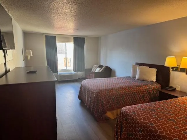 Bed in Budgetel Inns & Suites