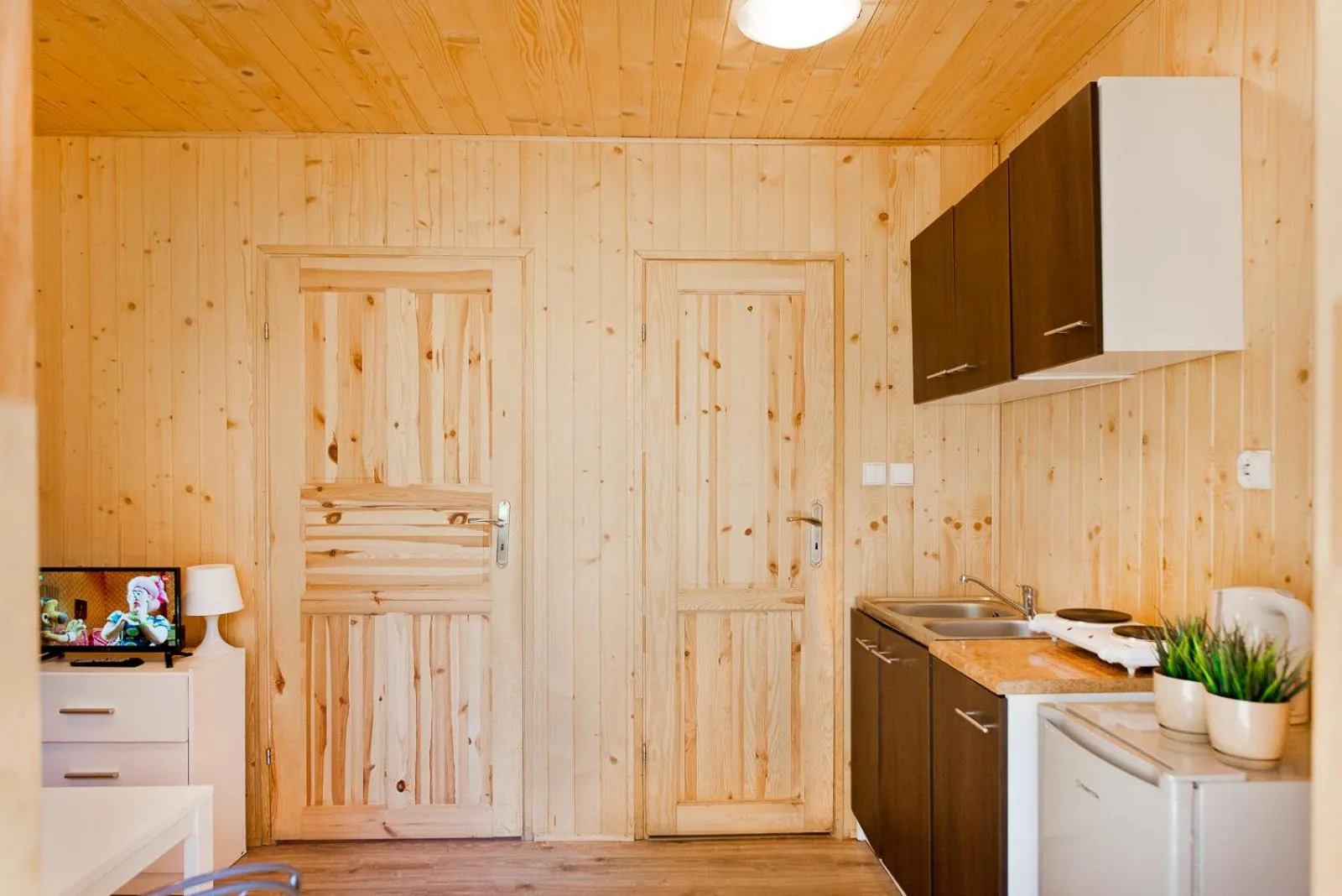 Kitchen or kitchenette in Ośrodek Wypoczynkowy Cubex