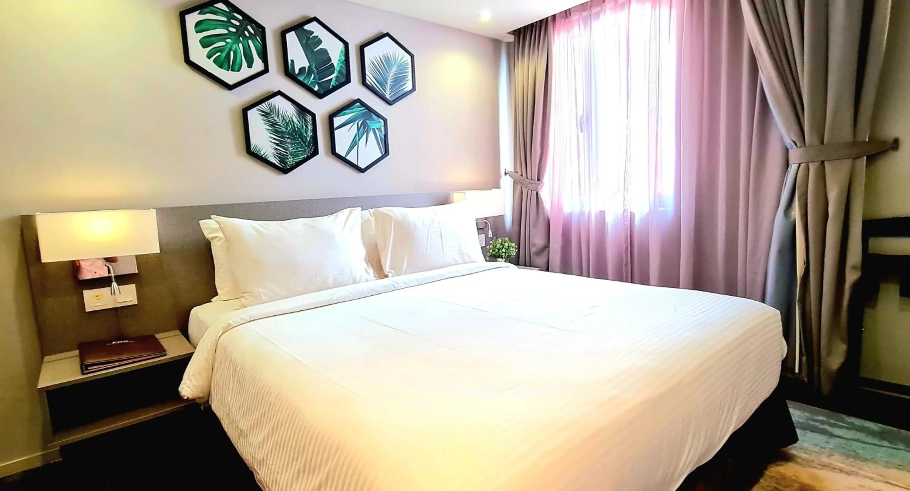 Bedroom, Bed in Bahari Parade Hotel Managed by The Ascott Limited