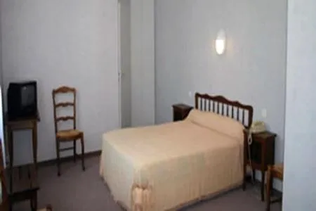 Photo of the whole room, Bed in Hôtel du Marché