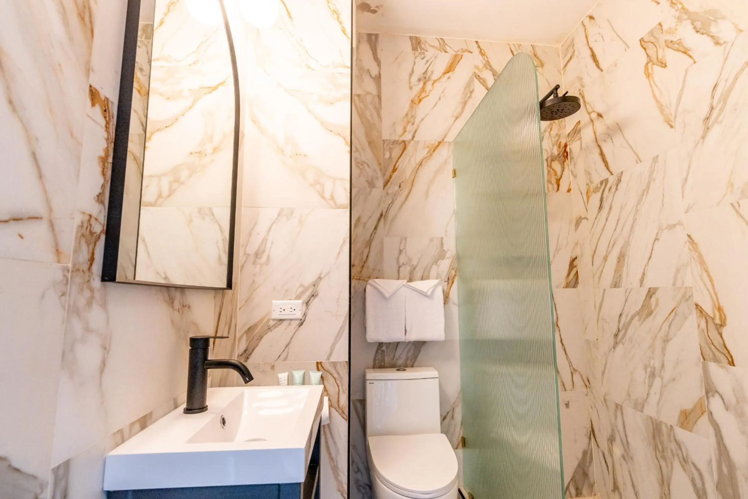 Bathroom in Travellers Beach Resort