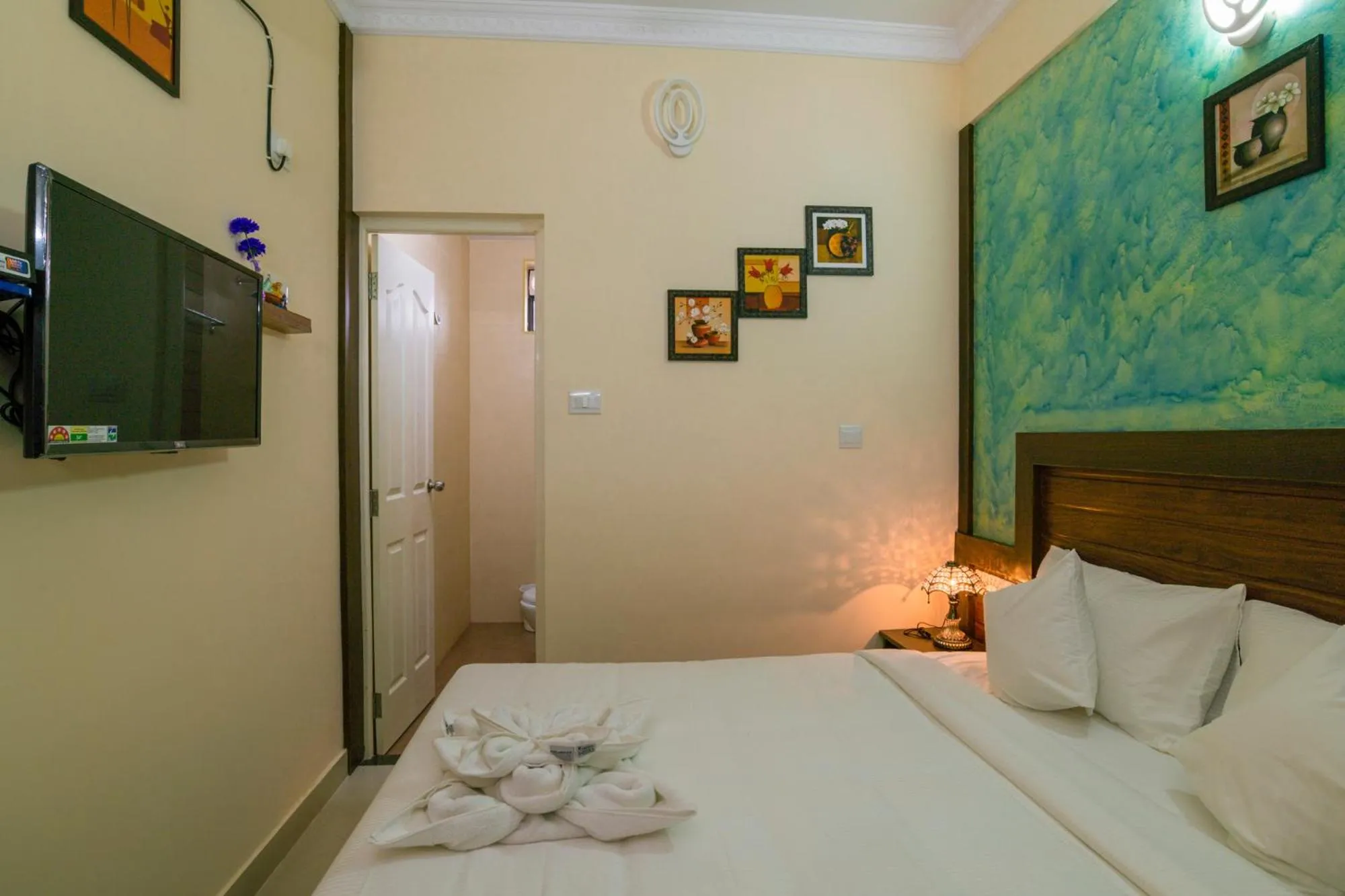 Decorative detail, Bed in Blue Bell Cochin Airport Hotel