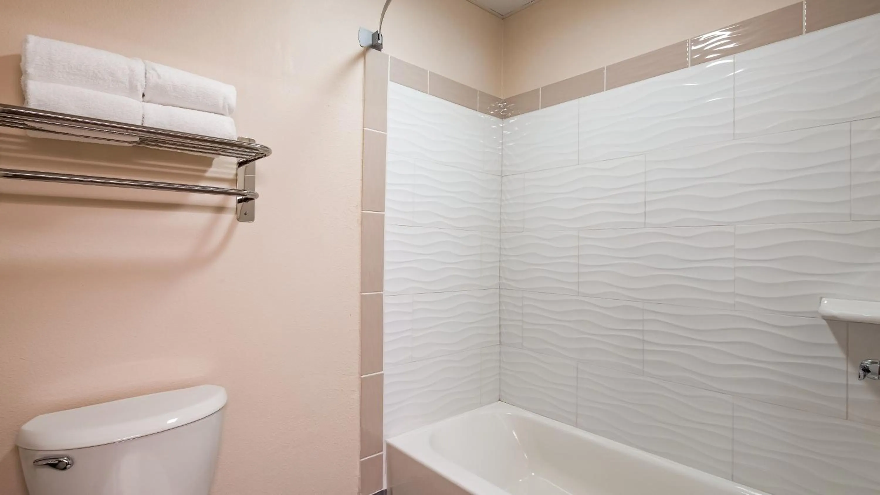 Bathroom in Super 8 by Wyndham Neillsville WI