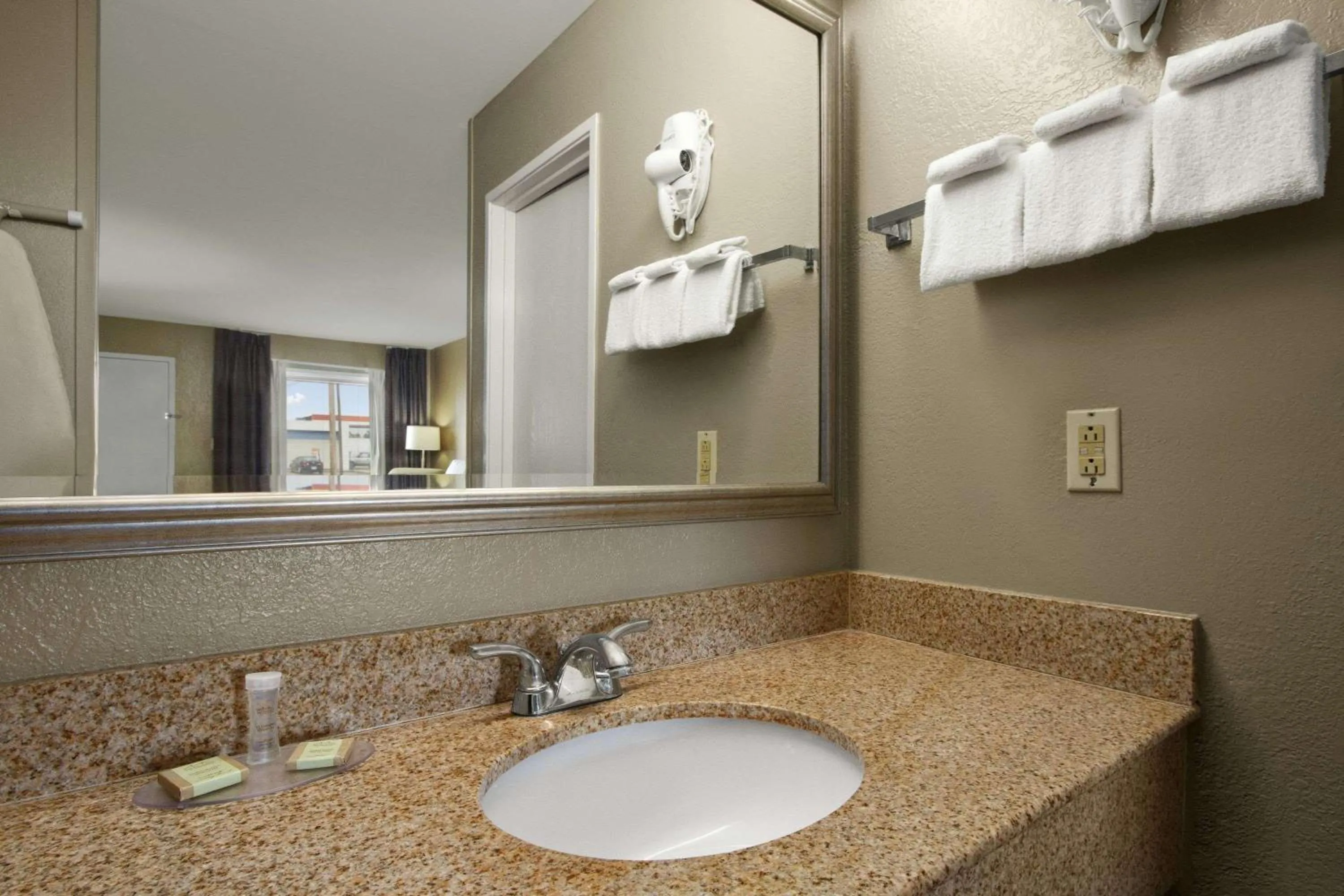 Bathroom in Super 8 by Wyndham Tupelo Airport