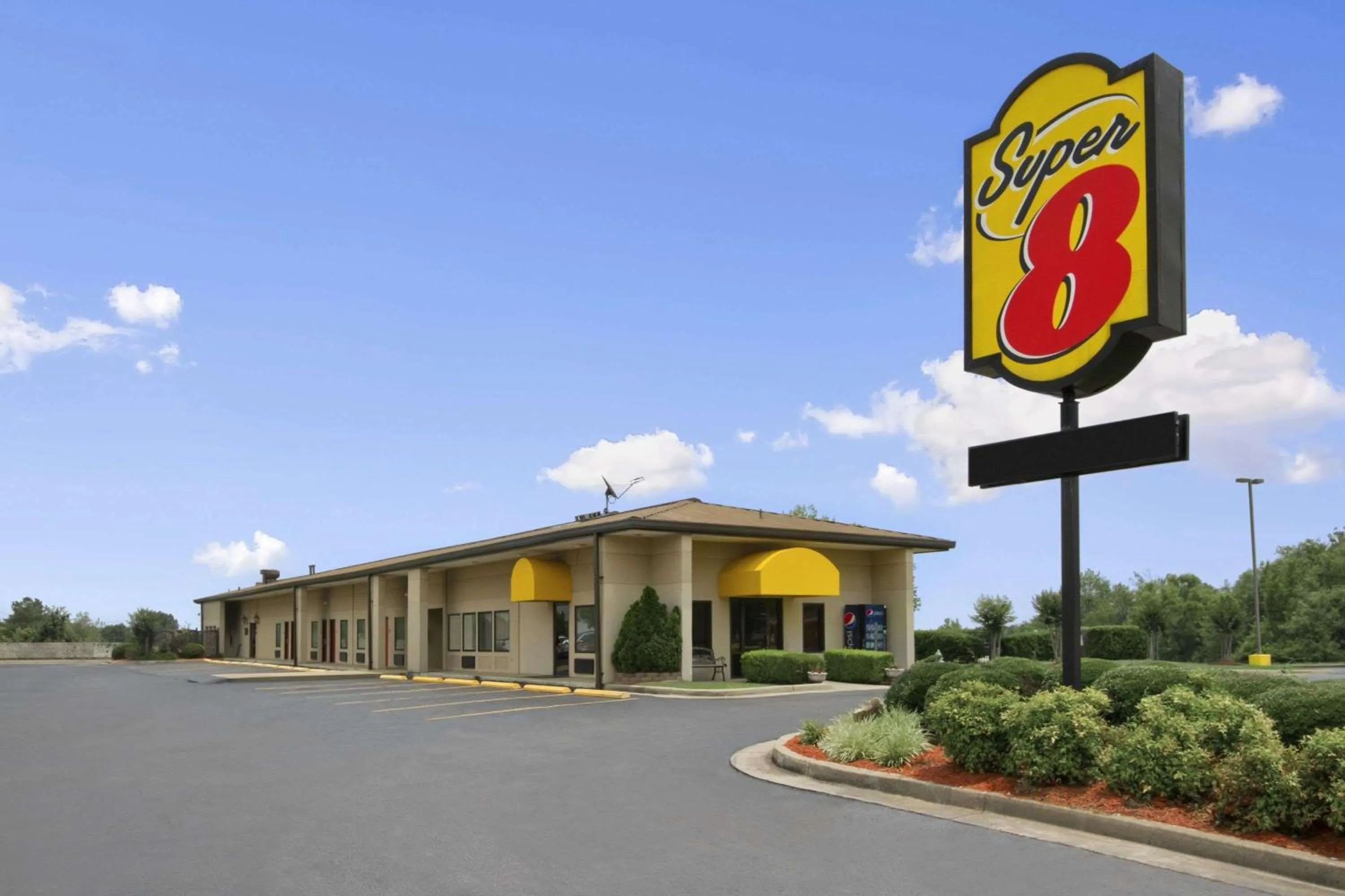 Property building in Super 8 by Wyndham Tupelo Airport