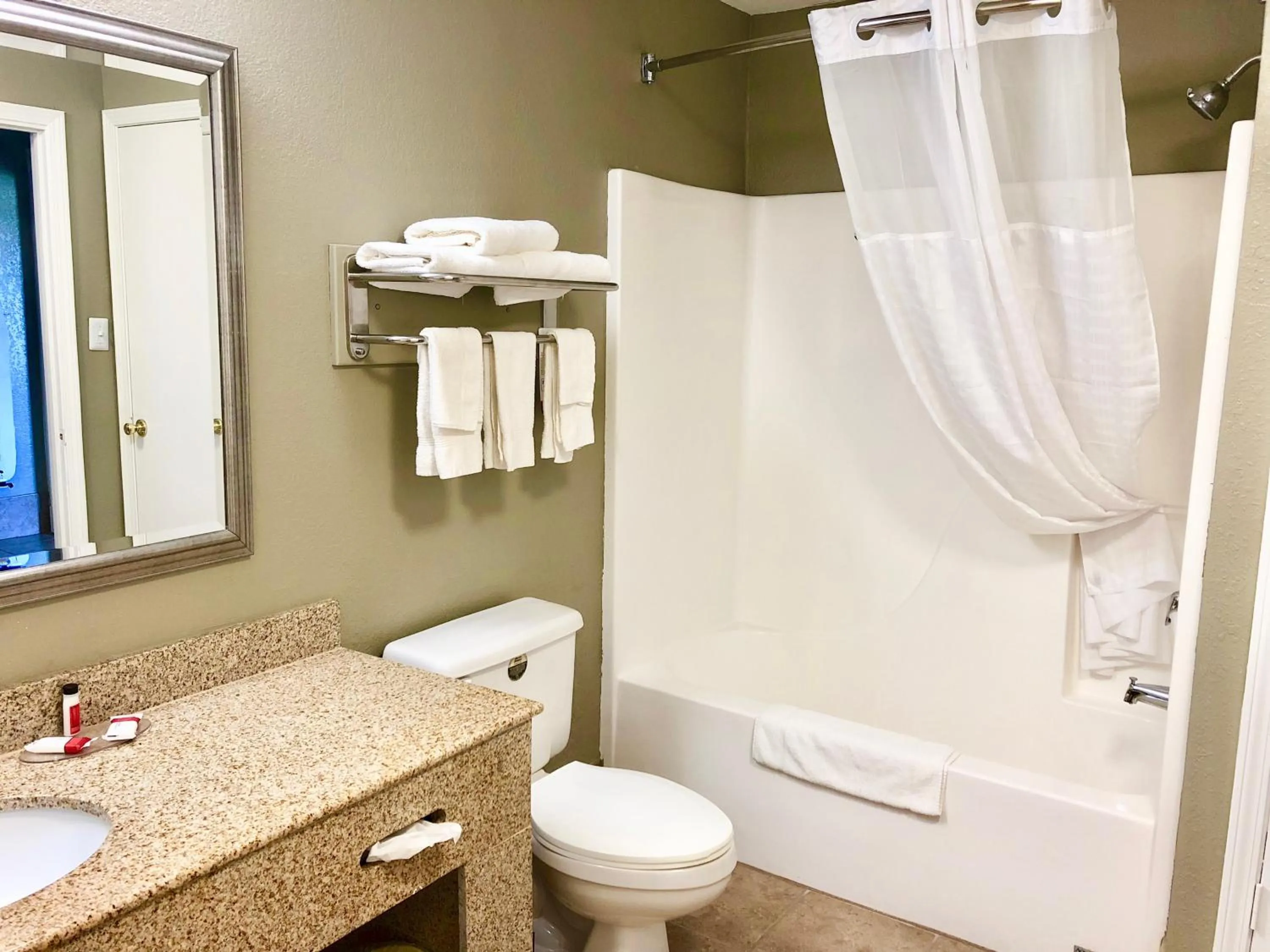 Shower in Super 8 by Wyndham Tupelo Airport