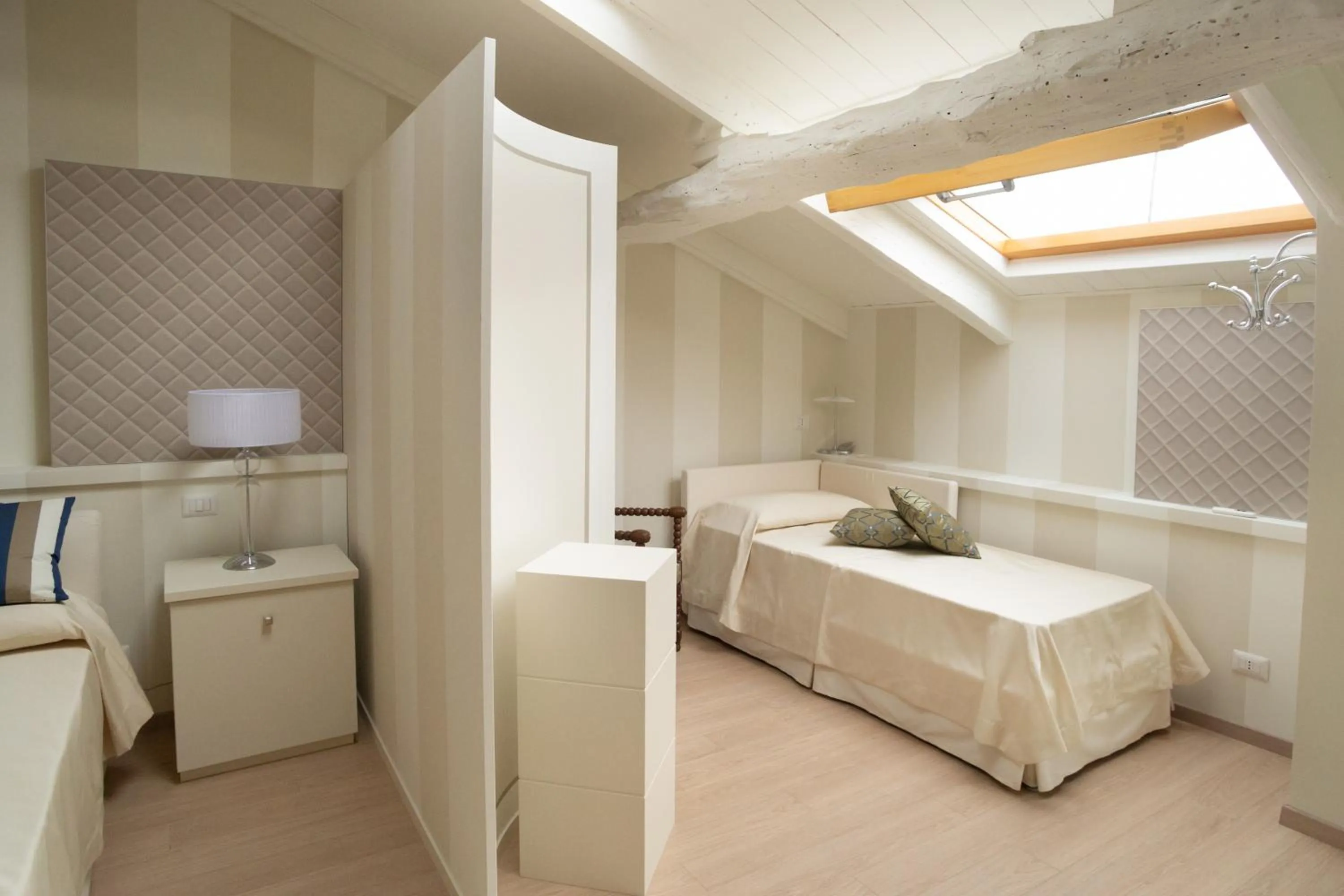 Bed in Maison Petit Perlage B&B and Champagne