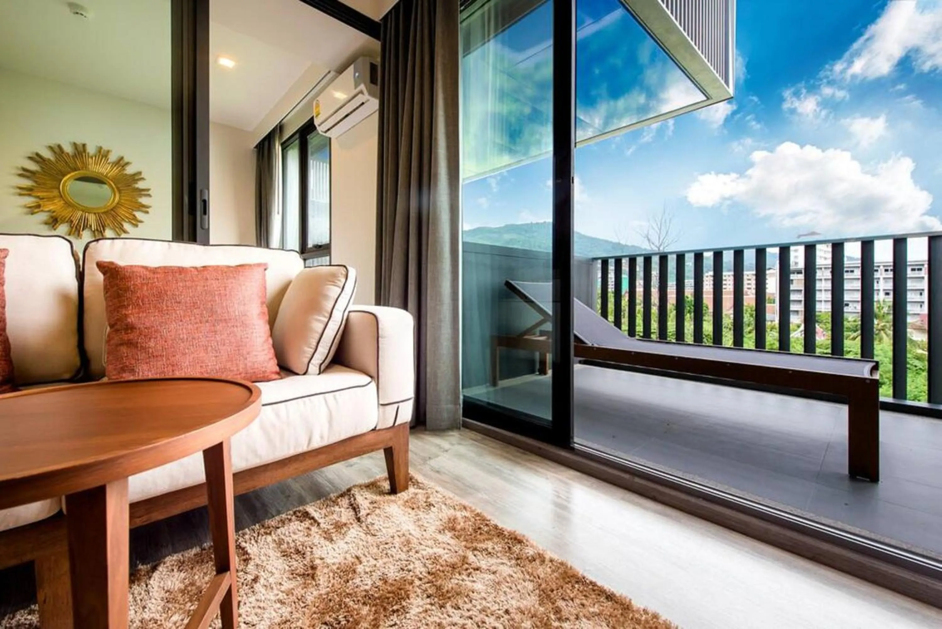 Living room in The Deck Patong by VIP