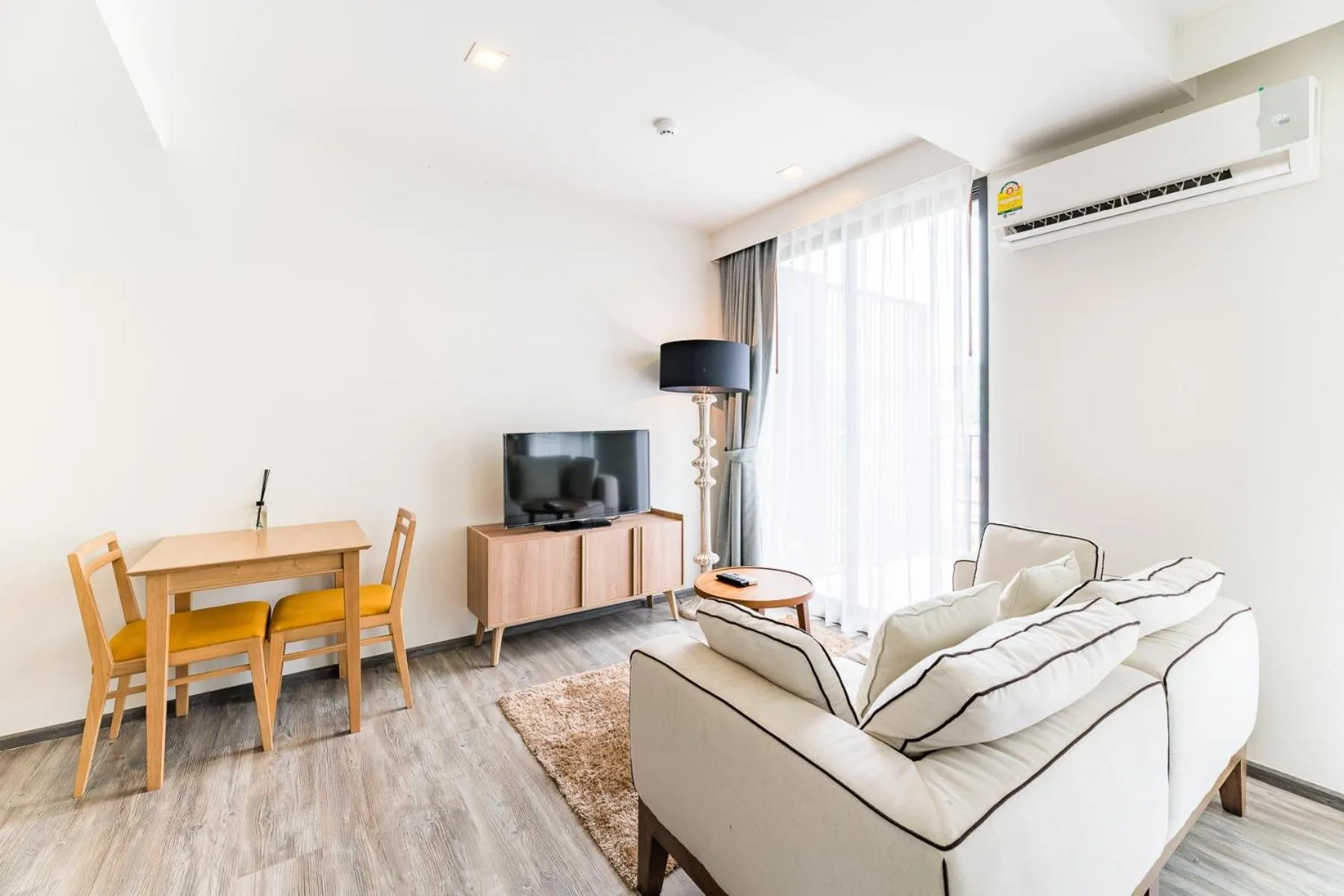 Living room in The Deck Patong by VIP