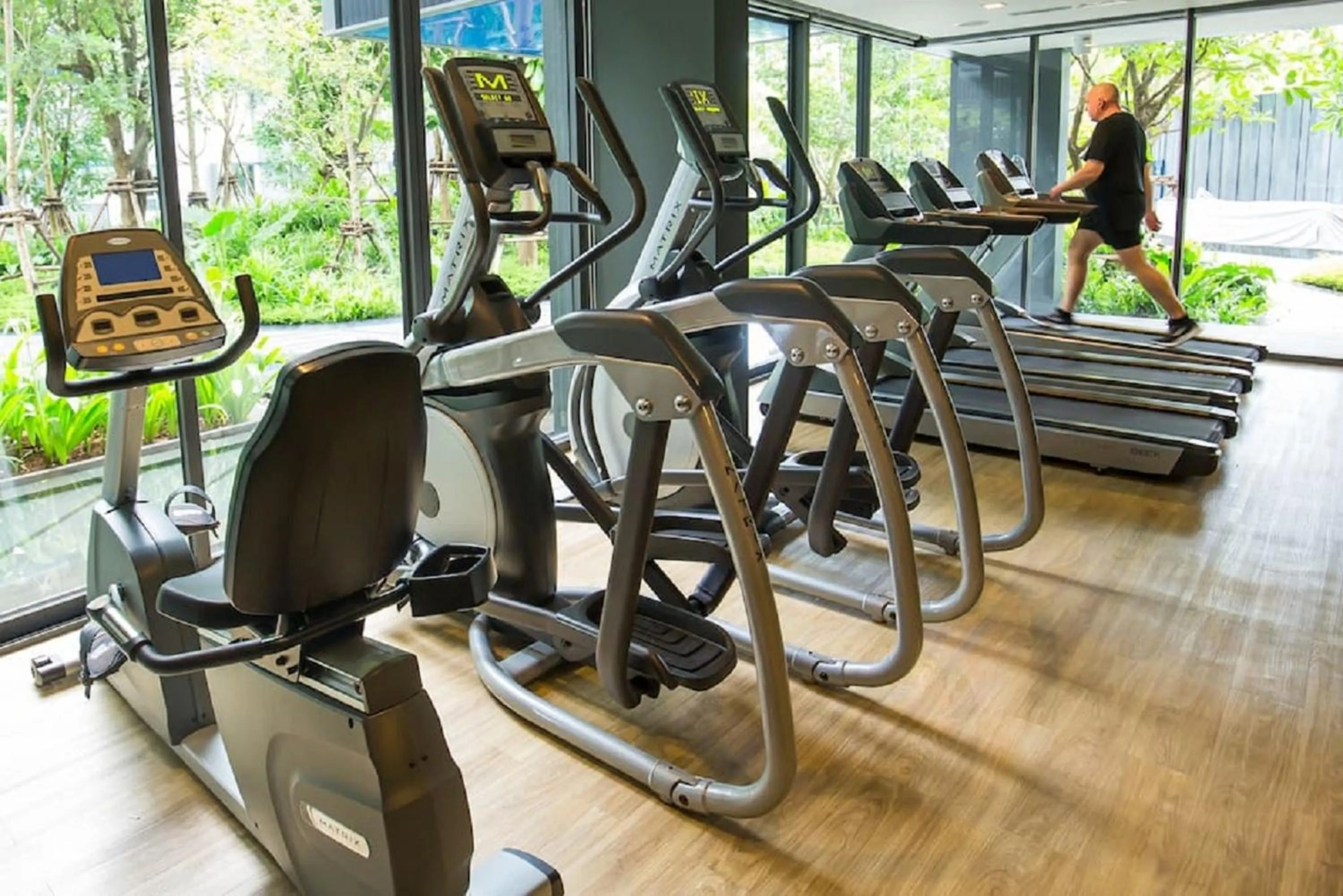 Fitness centre/facilities in The Deck Patong by VIP