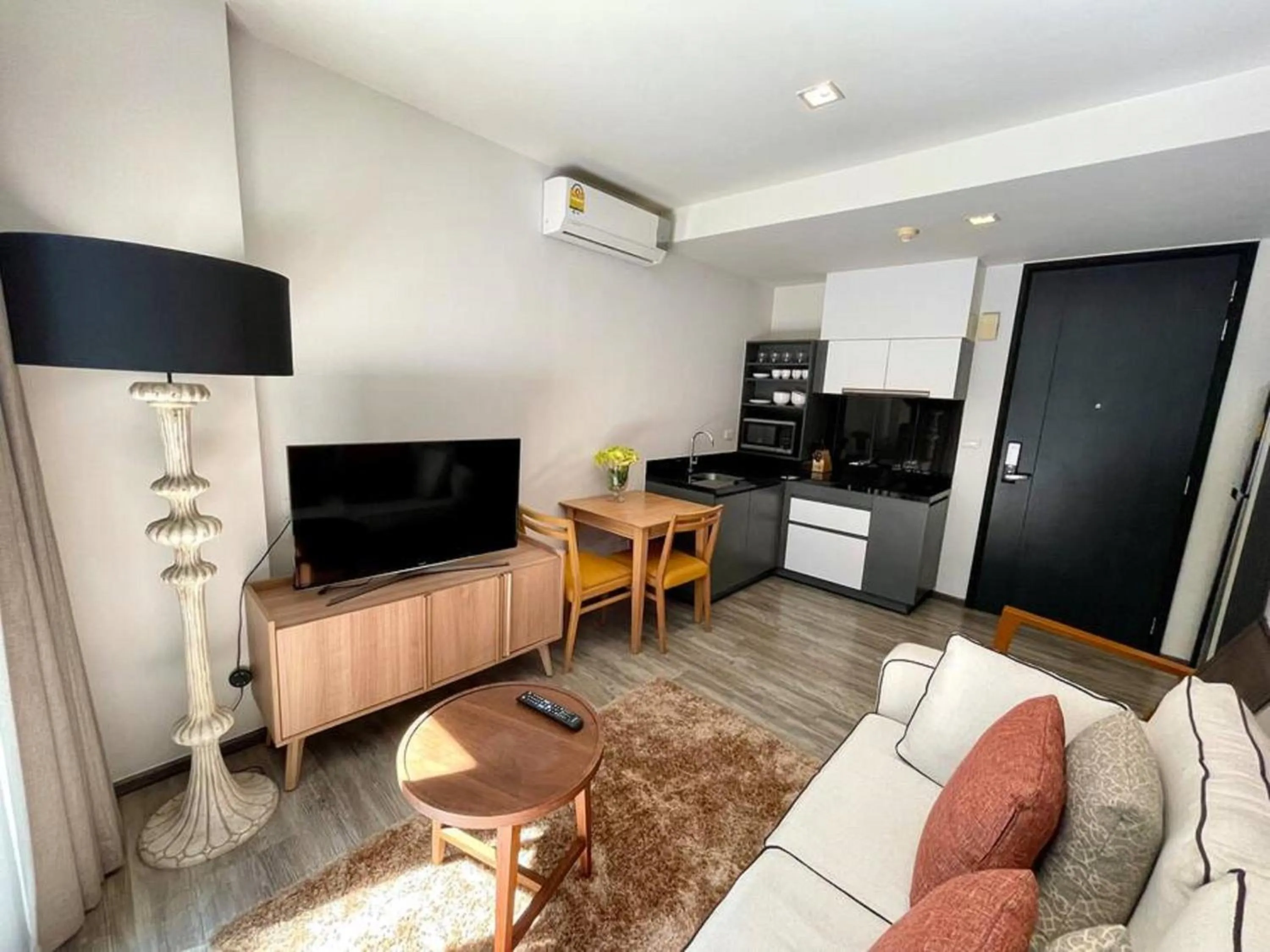 Living room in The Deck Patong by VIP