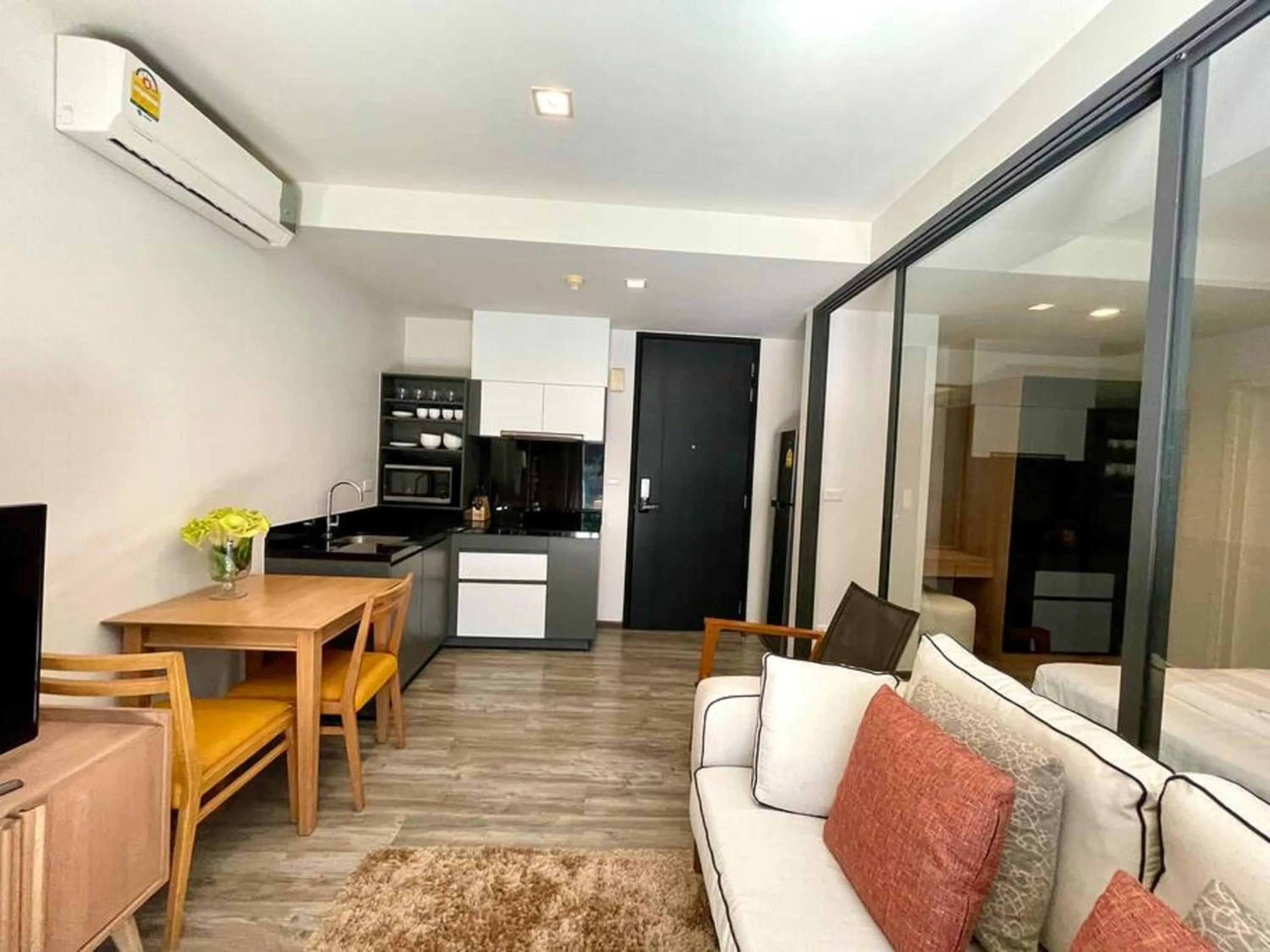 Living room in The Deck Patong by VIP