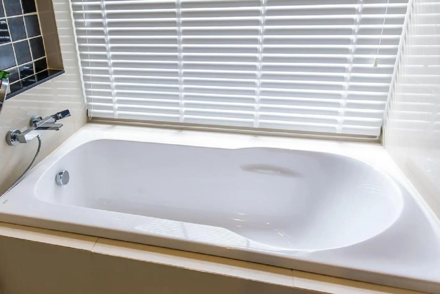 Bathroom in The Deck Patong by VIP