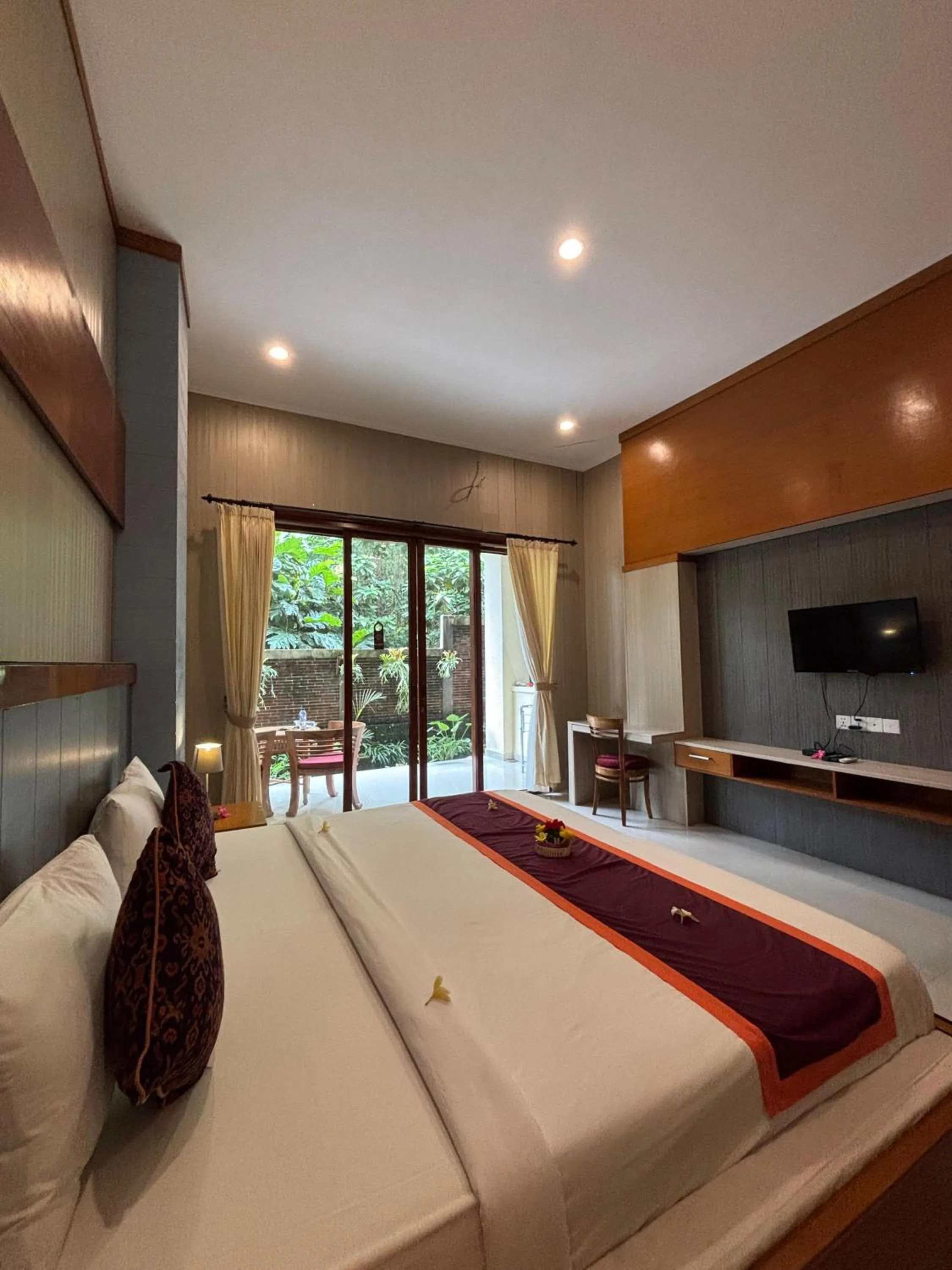 Bed in Adi Jaya Cottages Ubud Suites by EPS - CHSE Certified