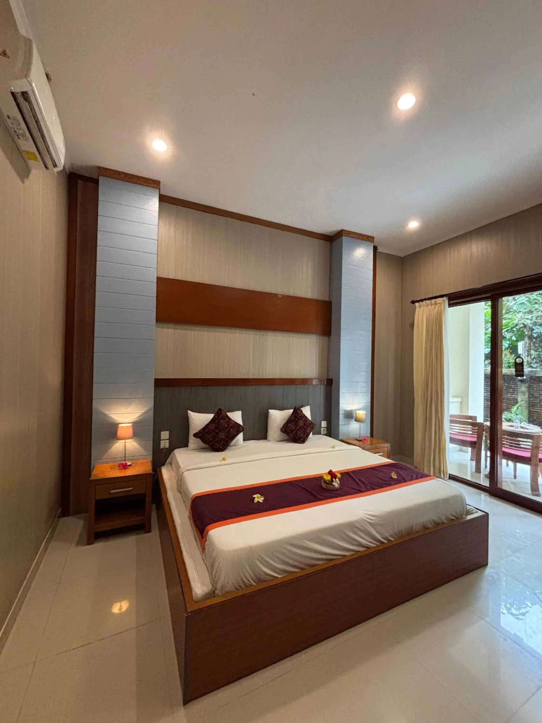 Bed in Adi Jaya Cottages Ubud Suites by EPS - CHSE Certified