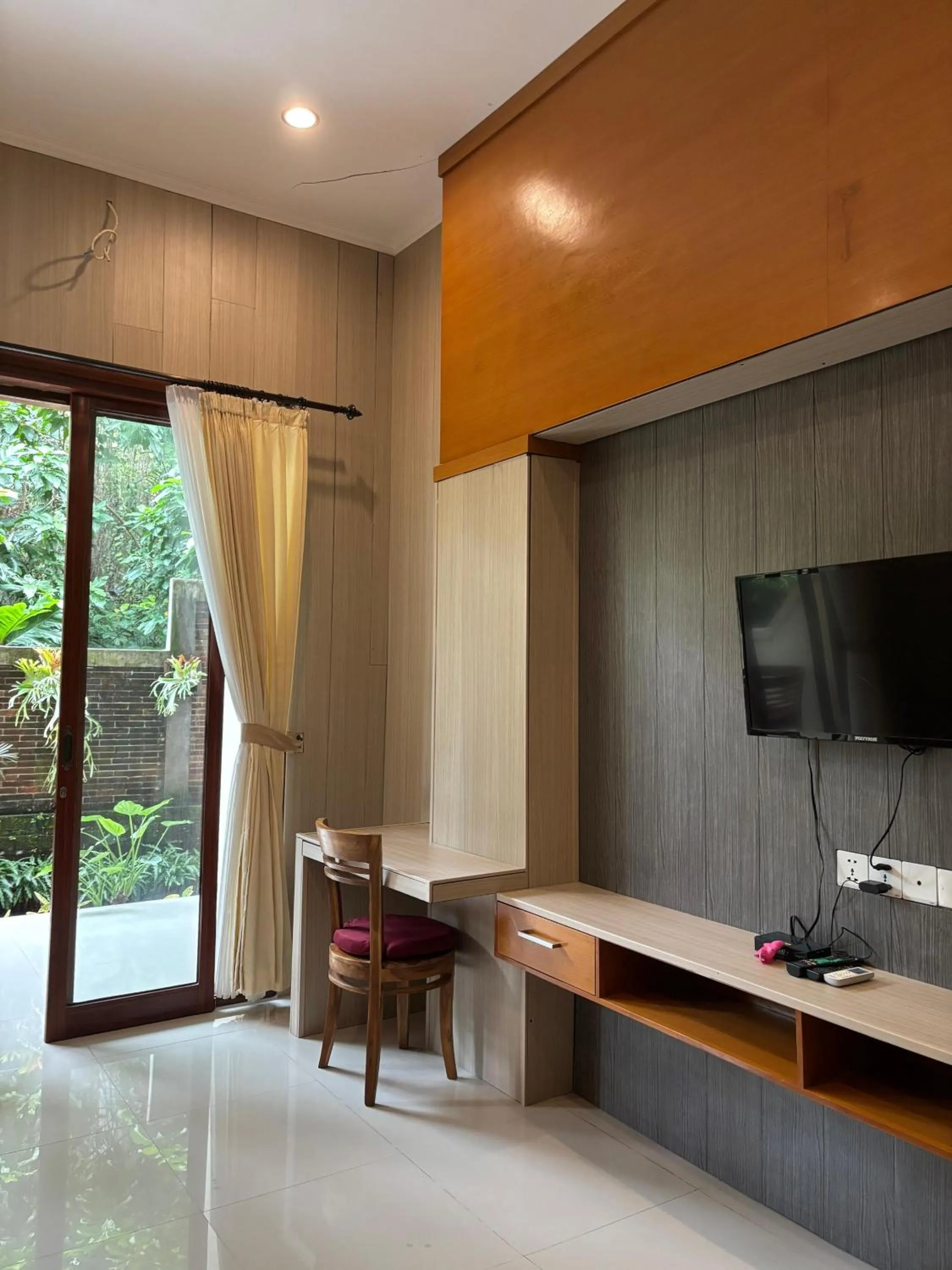TV and multimedia in Adi Jaya Cottages Ubud Suites by EPS - CHSE Certified