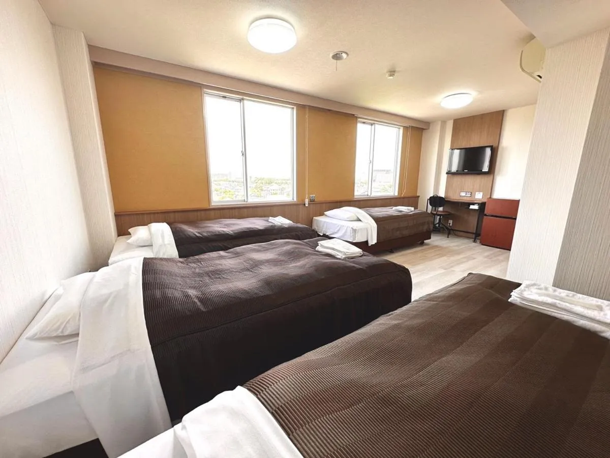 Bed in Tabist Tsukuba Sky Hotel