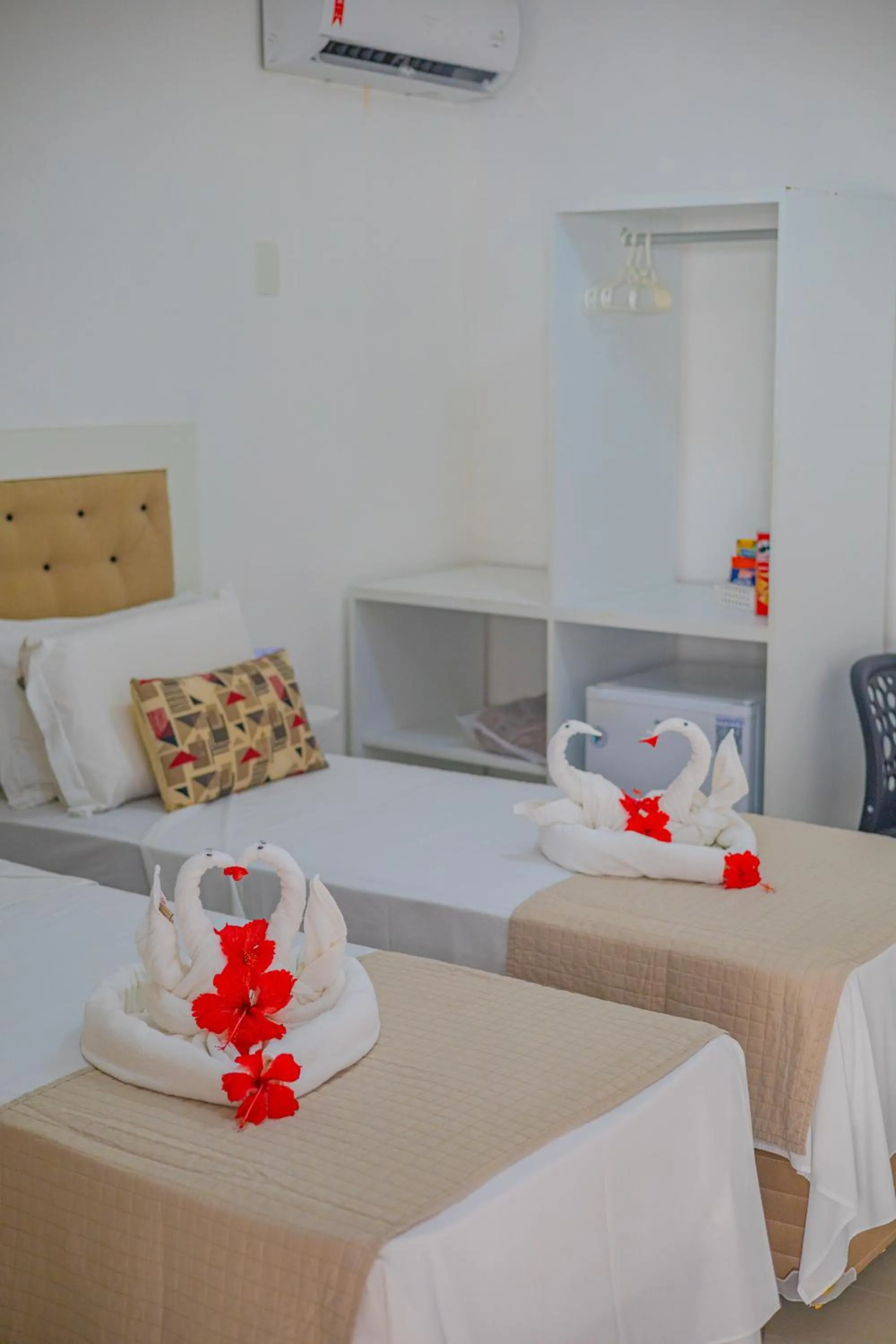 Bed in Pousada Polymar