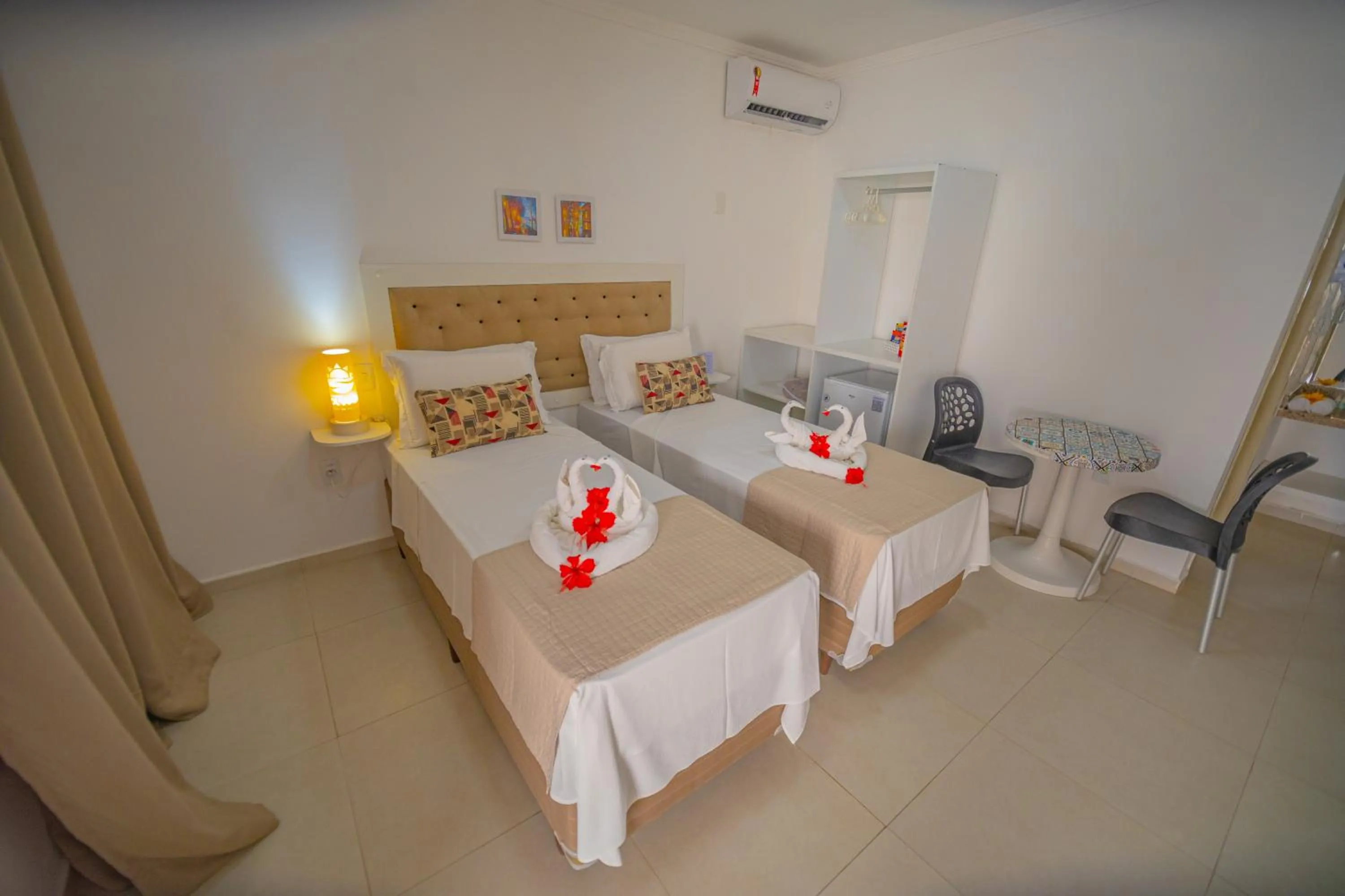 Bed in Pousada Polymar