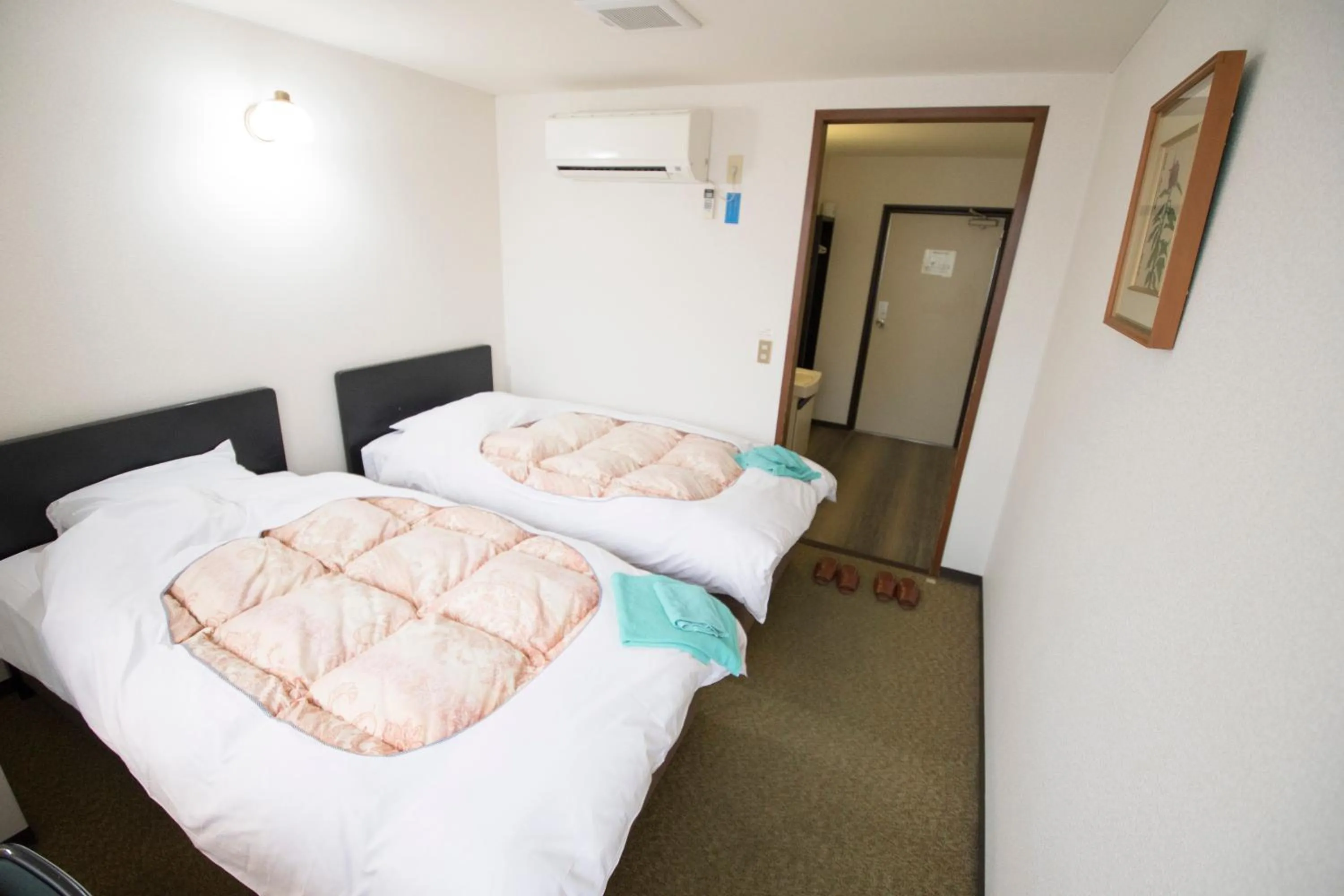 Bed in Hikone Station Hotel
