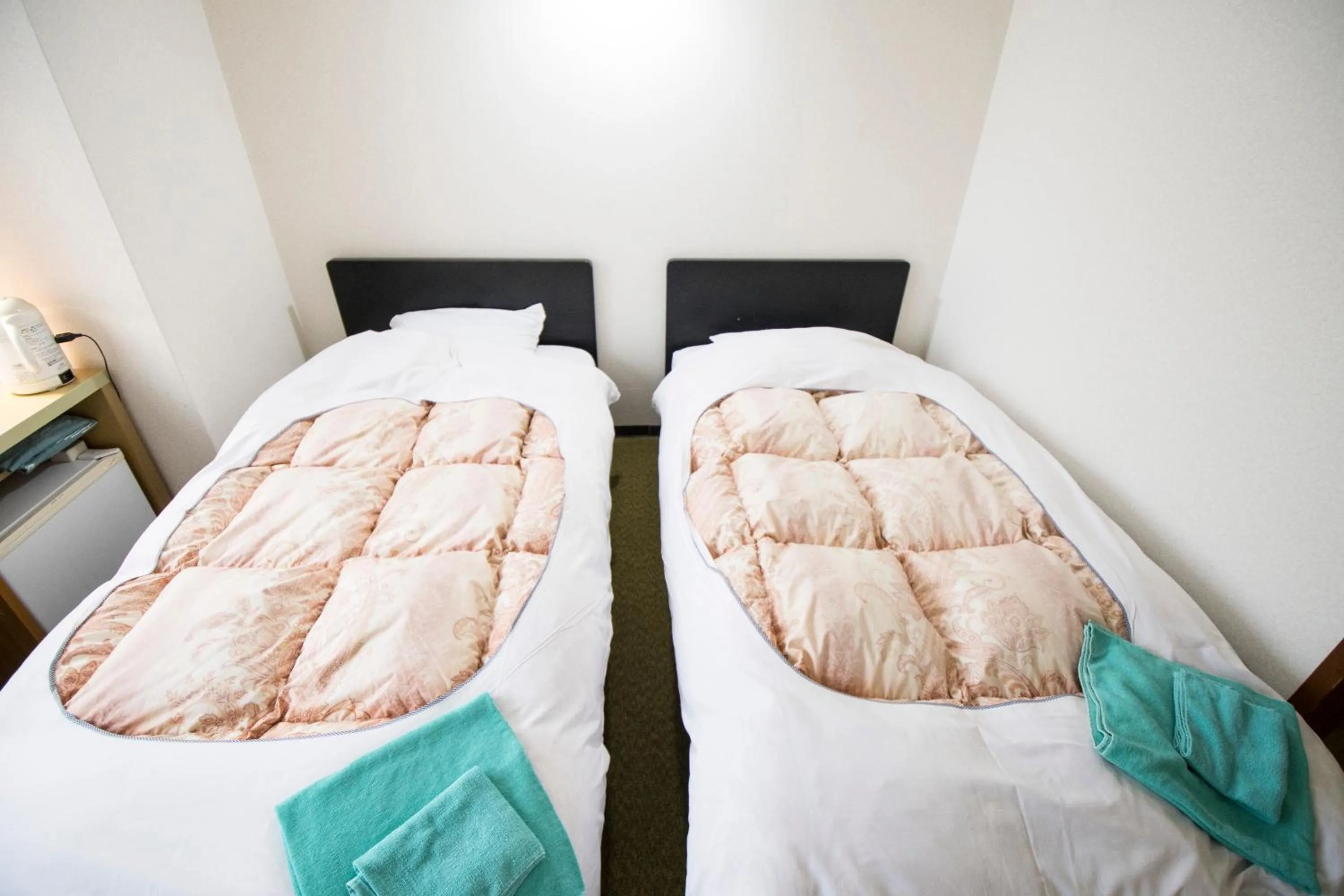 Bed in Hikone Station Hotel