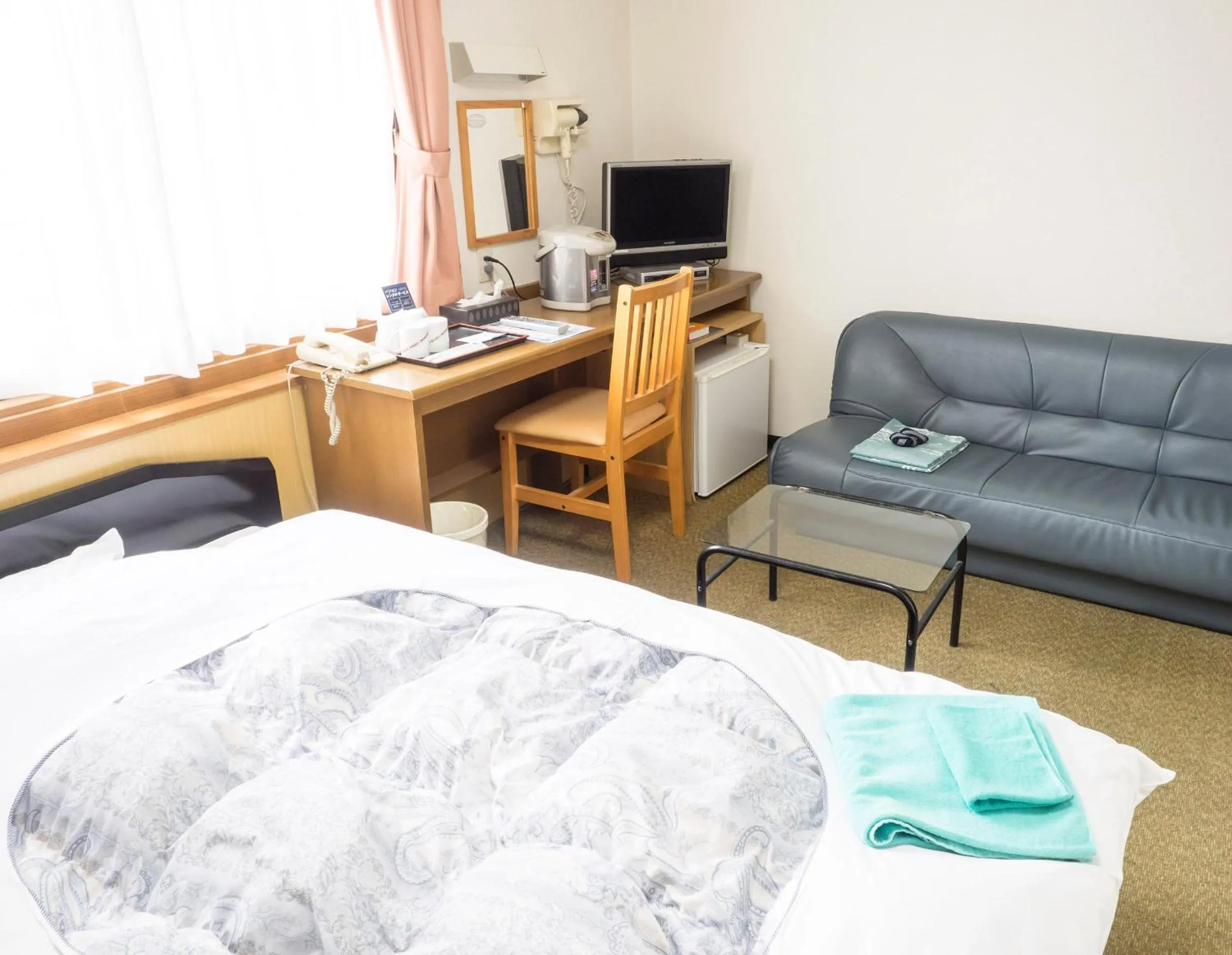 Bed in Hikone Station Hotel