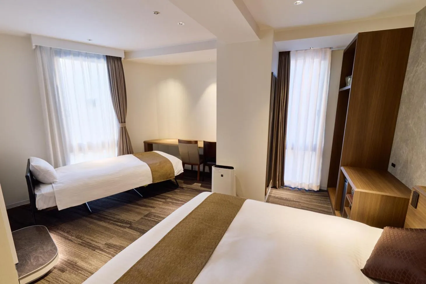 Bed in Ginza International Hotel