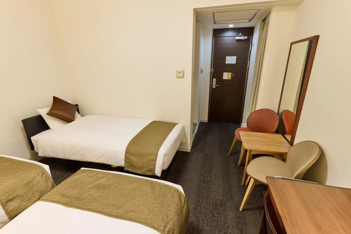 Bed in Ginza International Hotel