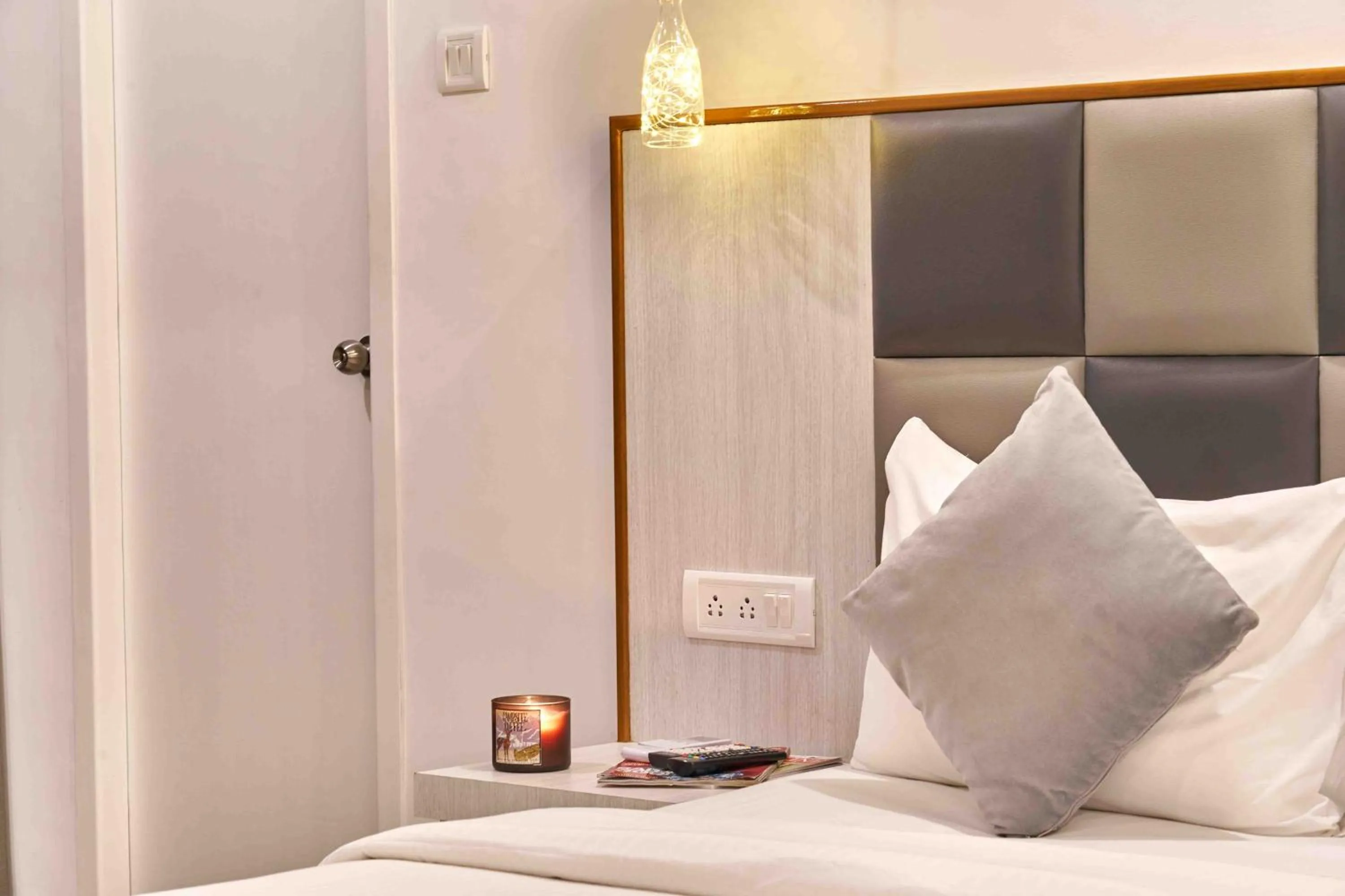 Bed in Hotel Mamallaa Heritage