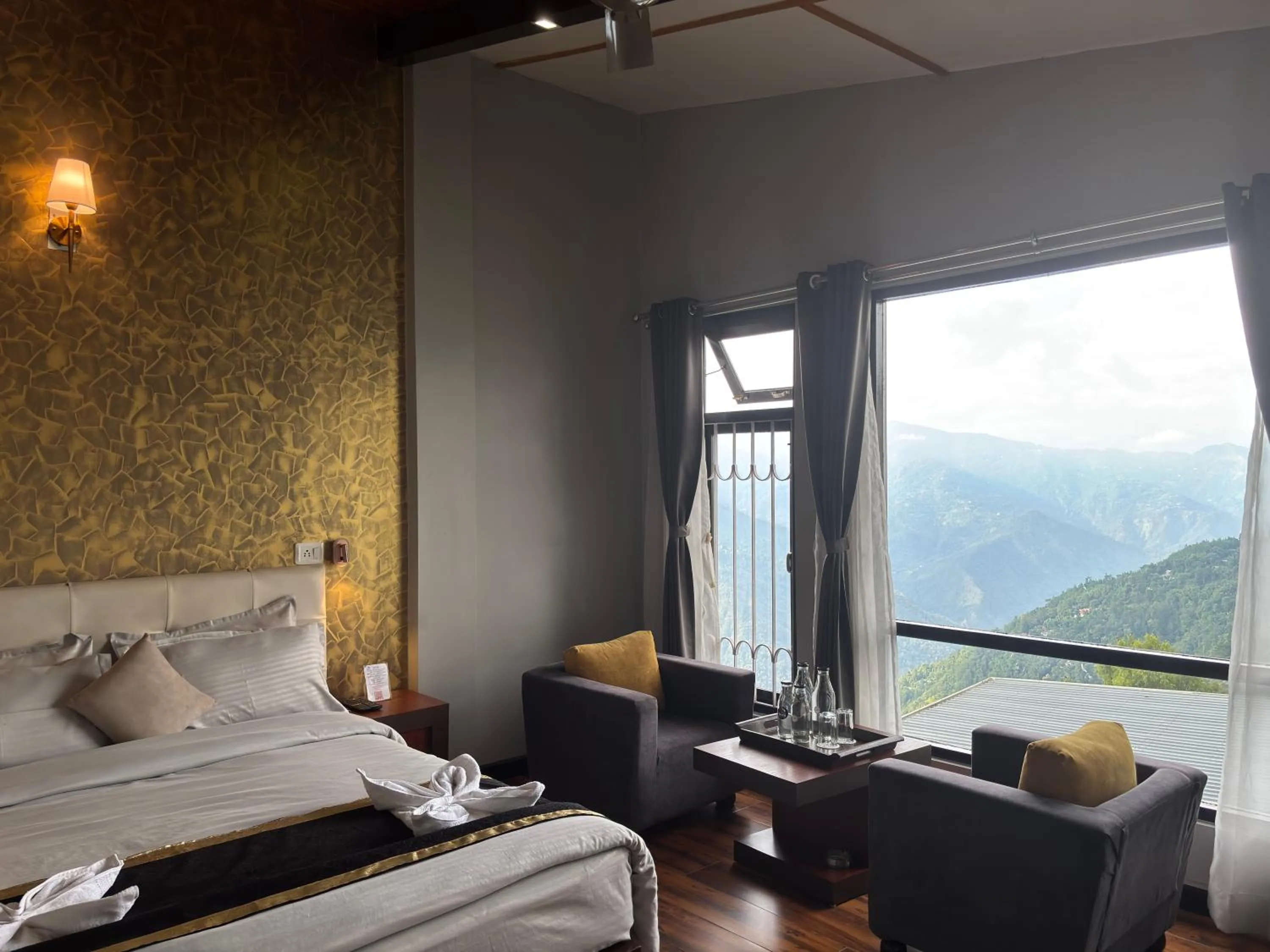 Bed in Sood's Himalayan Vista