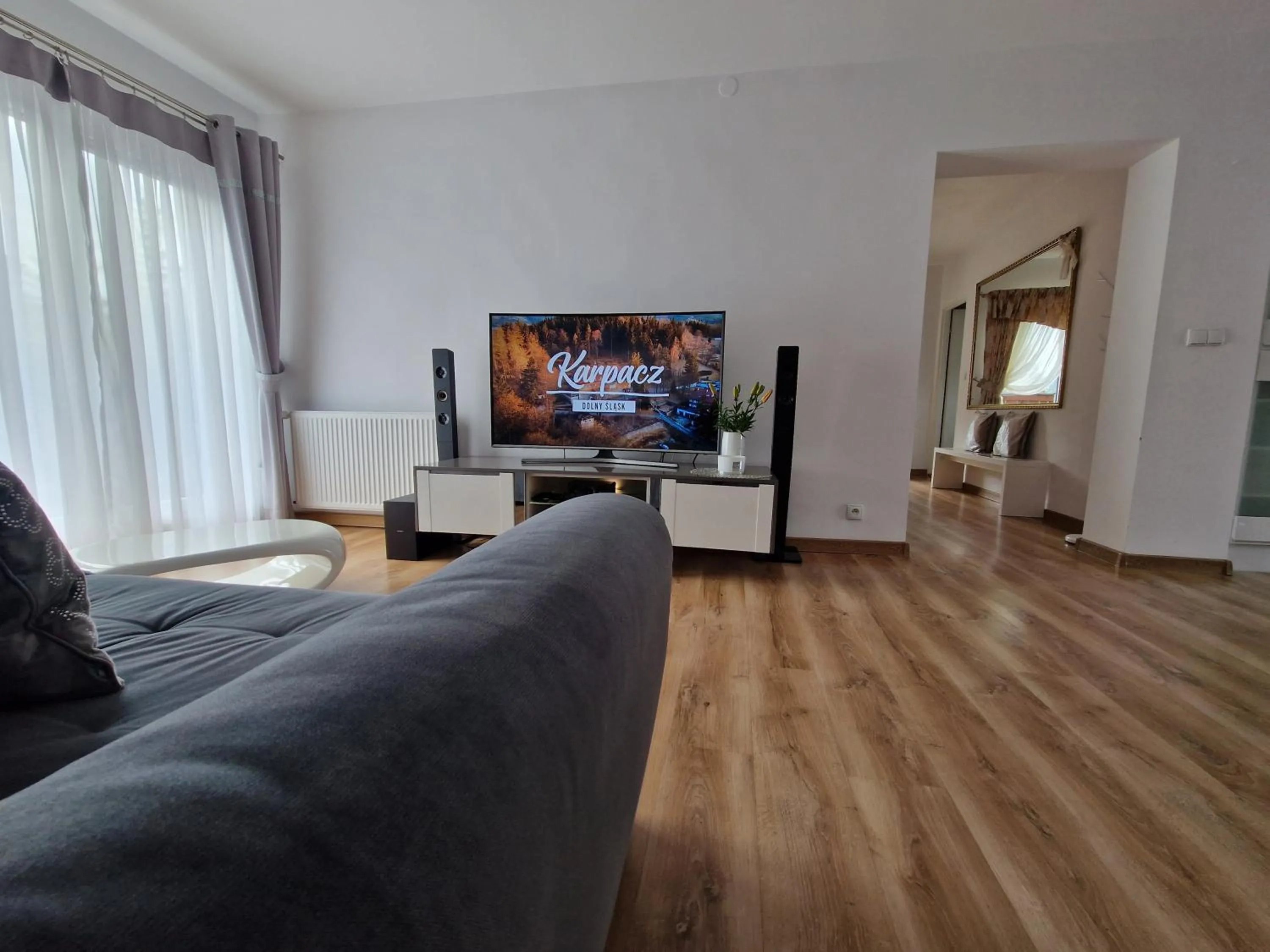 Communal lounge/ TV room in Apartamenty Alcatraz z jacuzzi