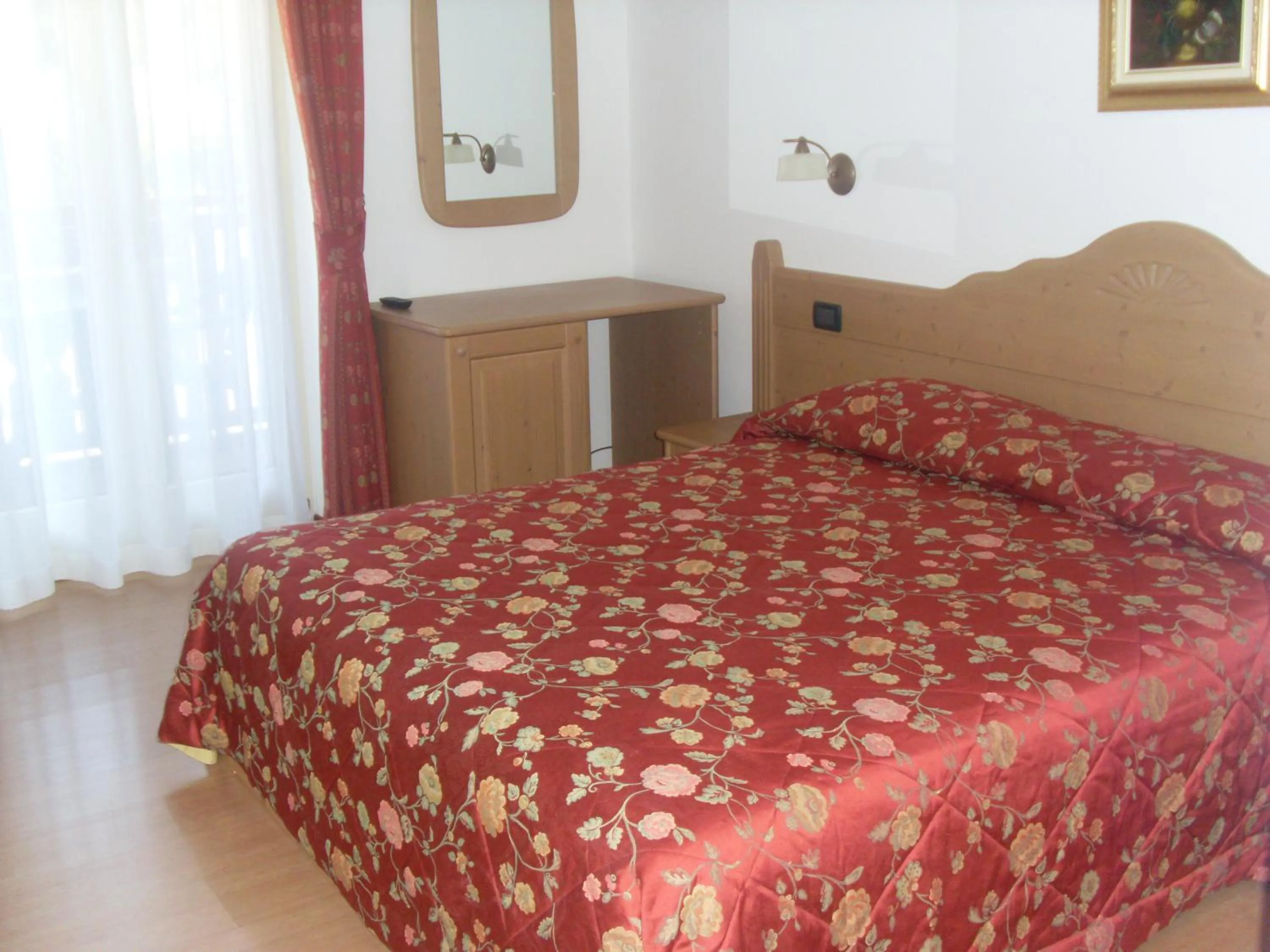 Bed in Garnì Lago Alpino