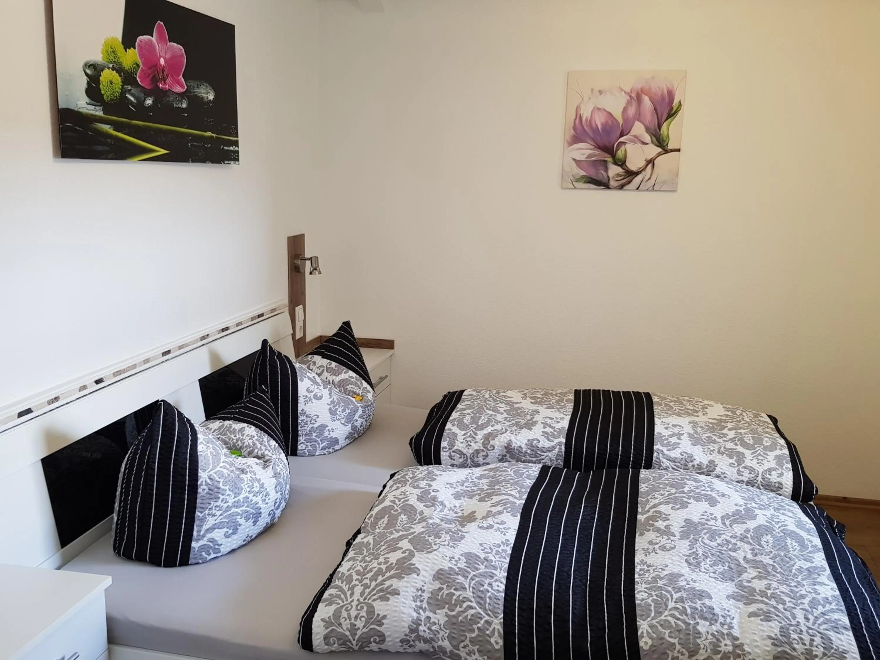 Bed in Macke`s Ferienwohnungen