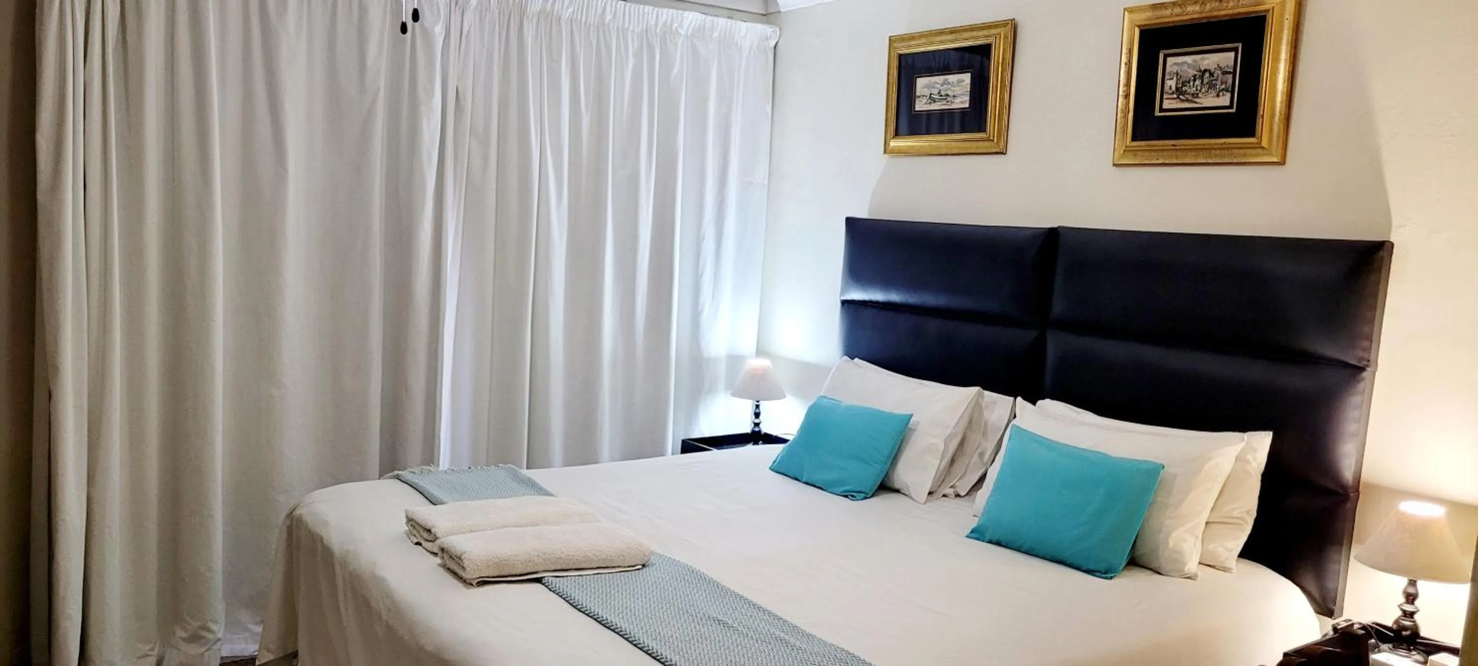 Photo of the whole room, Bed in Kennington Palms B&B/Self Catering