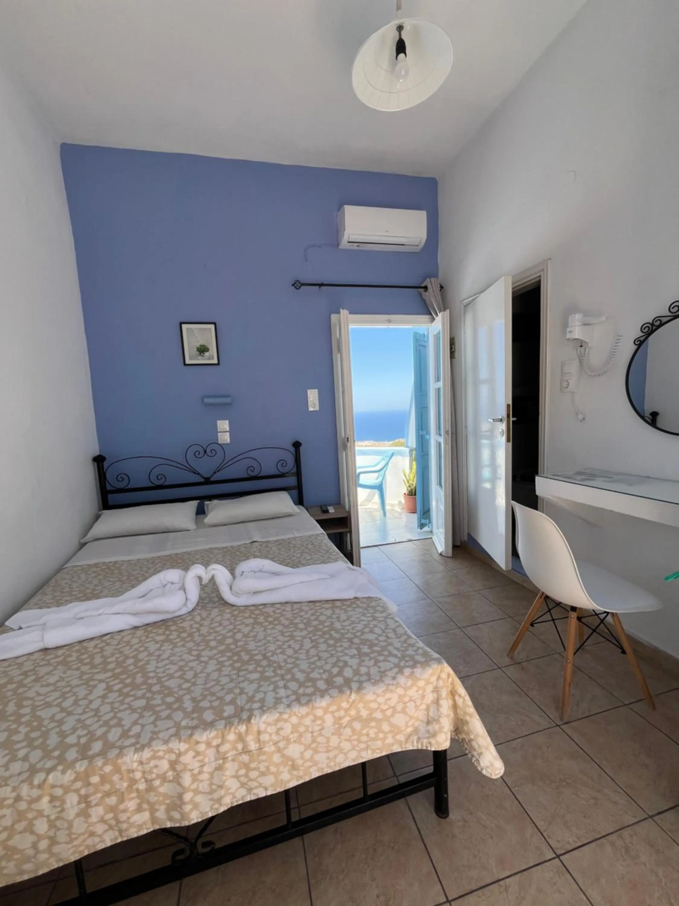 Bed in Stella Nomikou Apartments