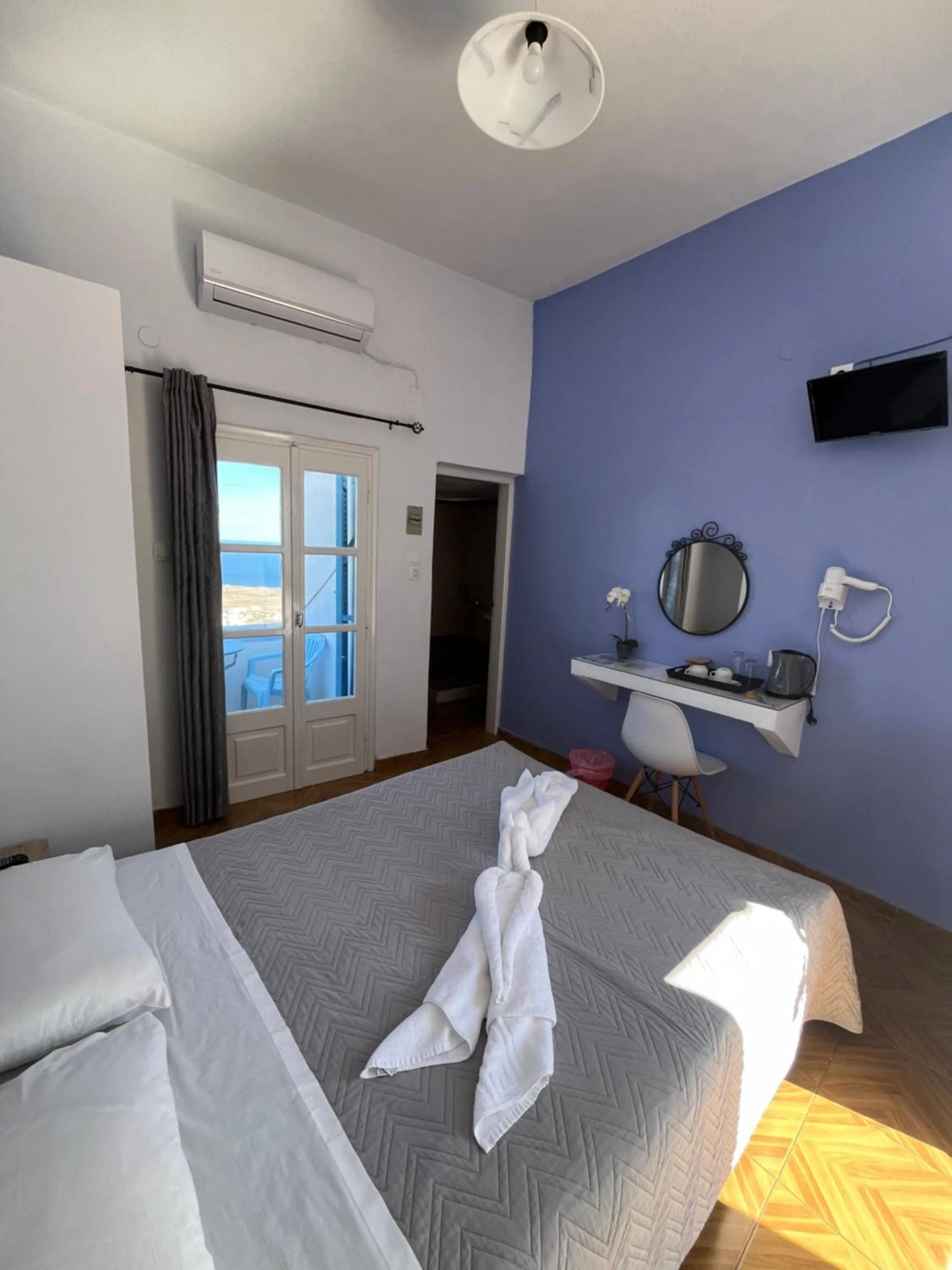 Bed in Stella Nomikou Apartments