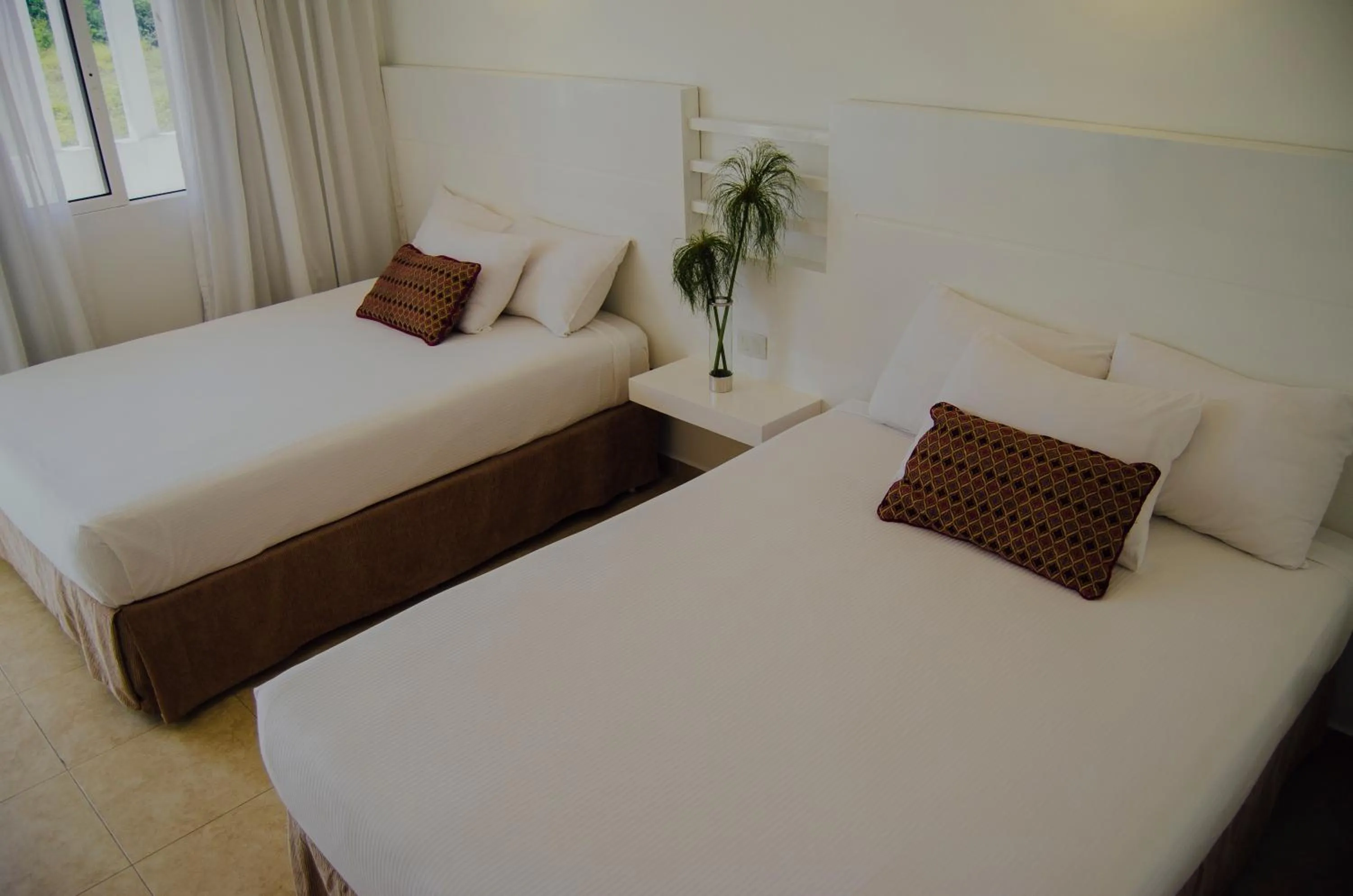 Bed in Agua Dorada Beach Hotel By Lidotel