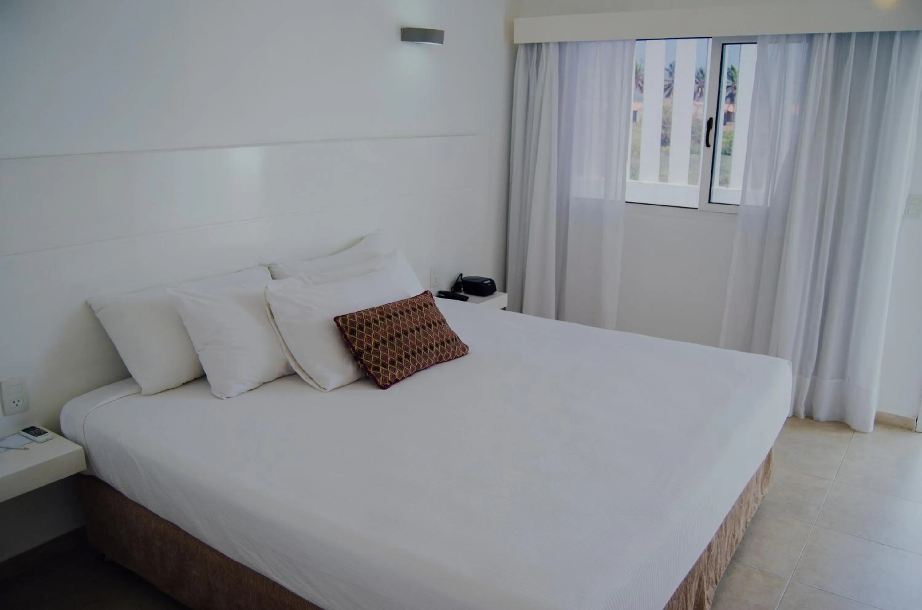 Bed in Agua Dorada Beach Hotel By Lidotel