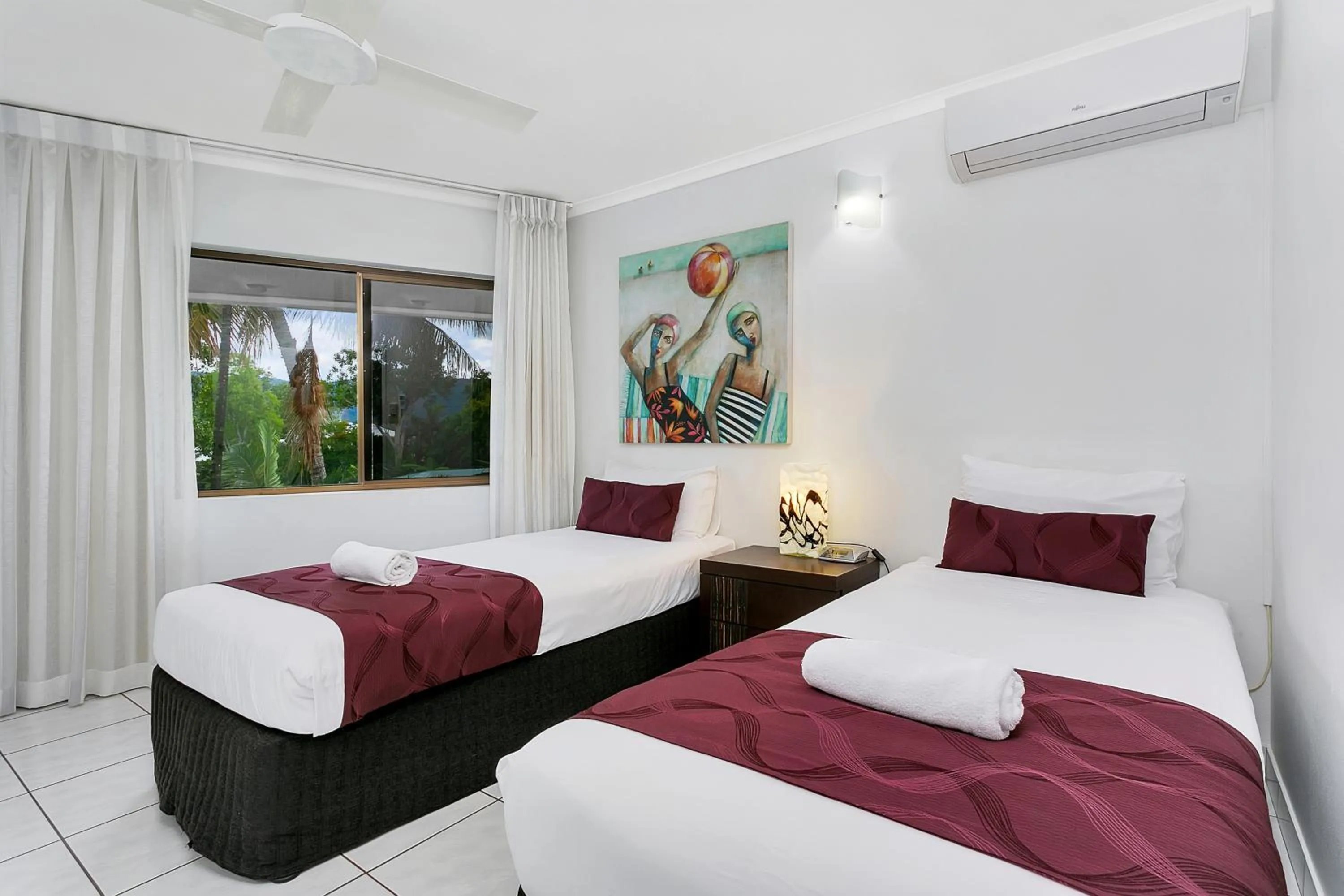 Bed in Roydon Beachfront Apartments
