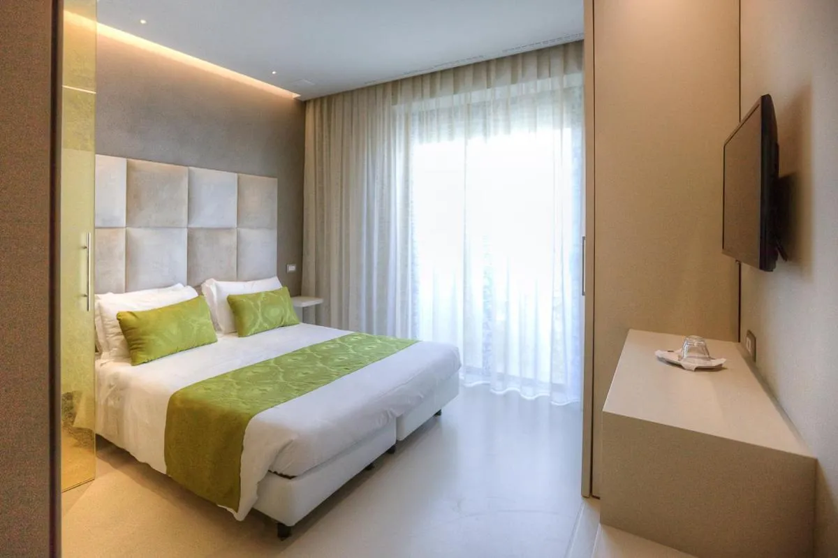 Bed in Hotel Nettuno