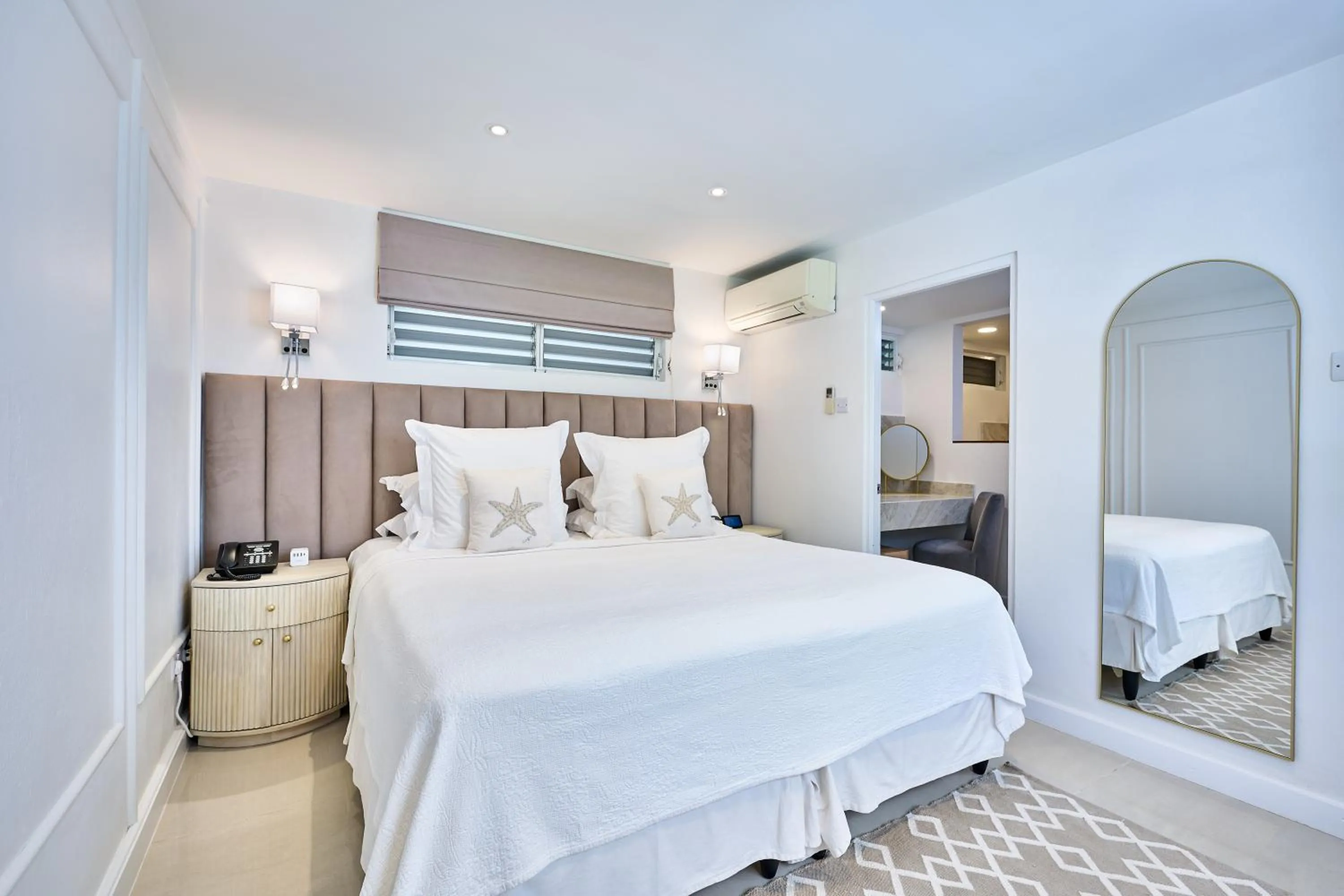 Bed in Calabash Hotel