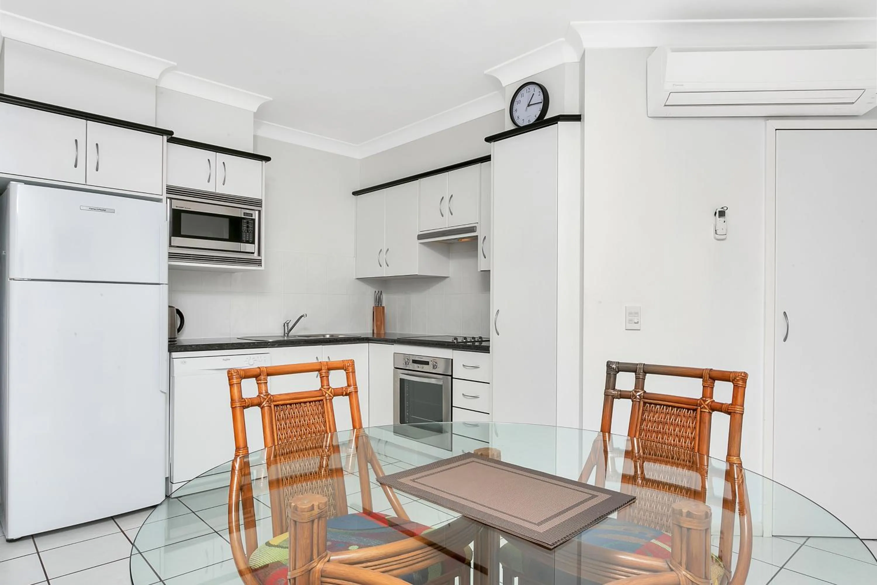 Kitchen or kitchenette in Beachfront Apartments on Trinity Beach